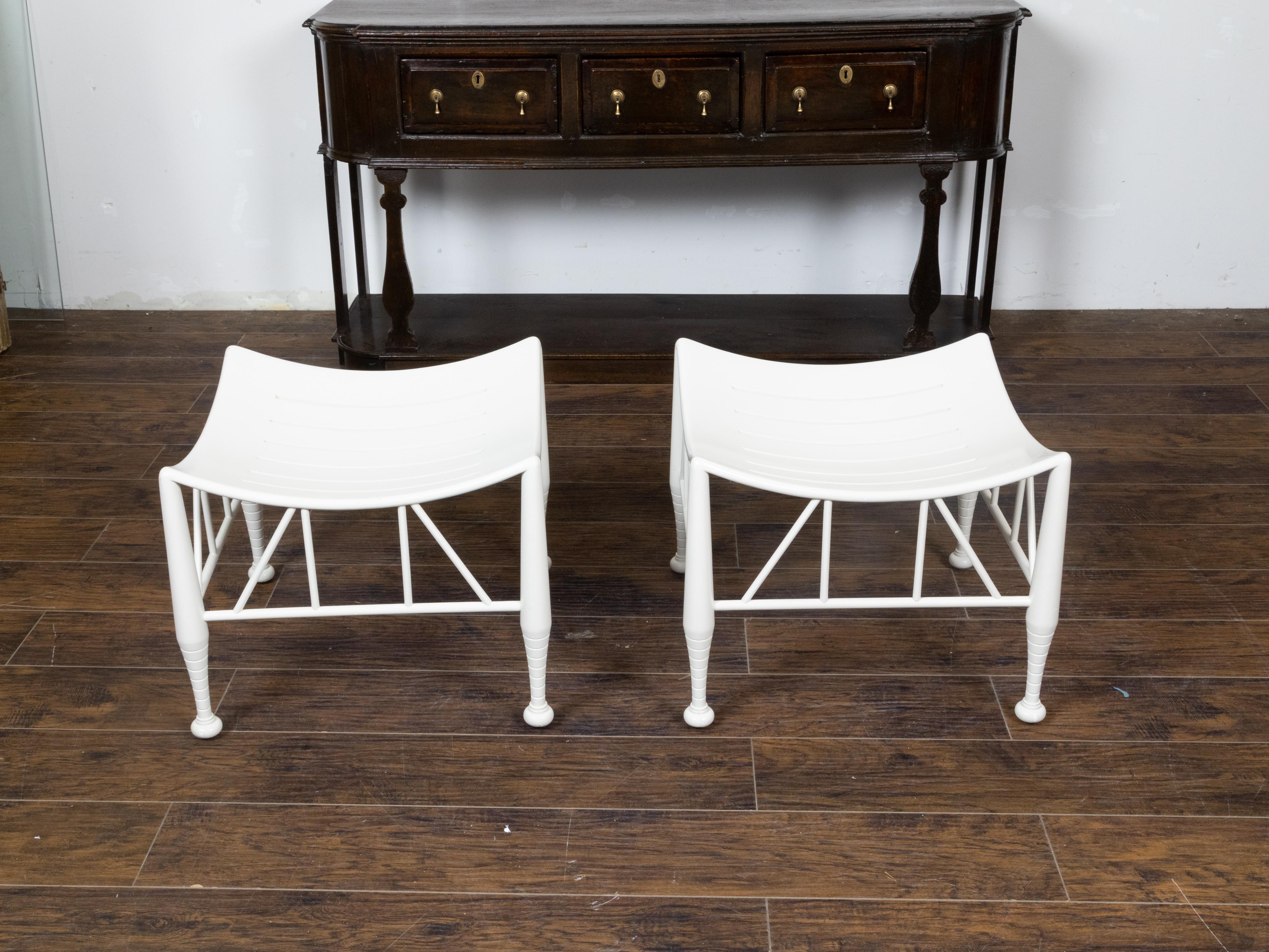 Carved Pair of Vintage English Egyptian Revival White Thebes Stools with Curving Seats For Sale