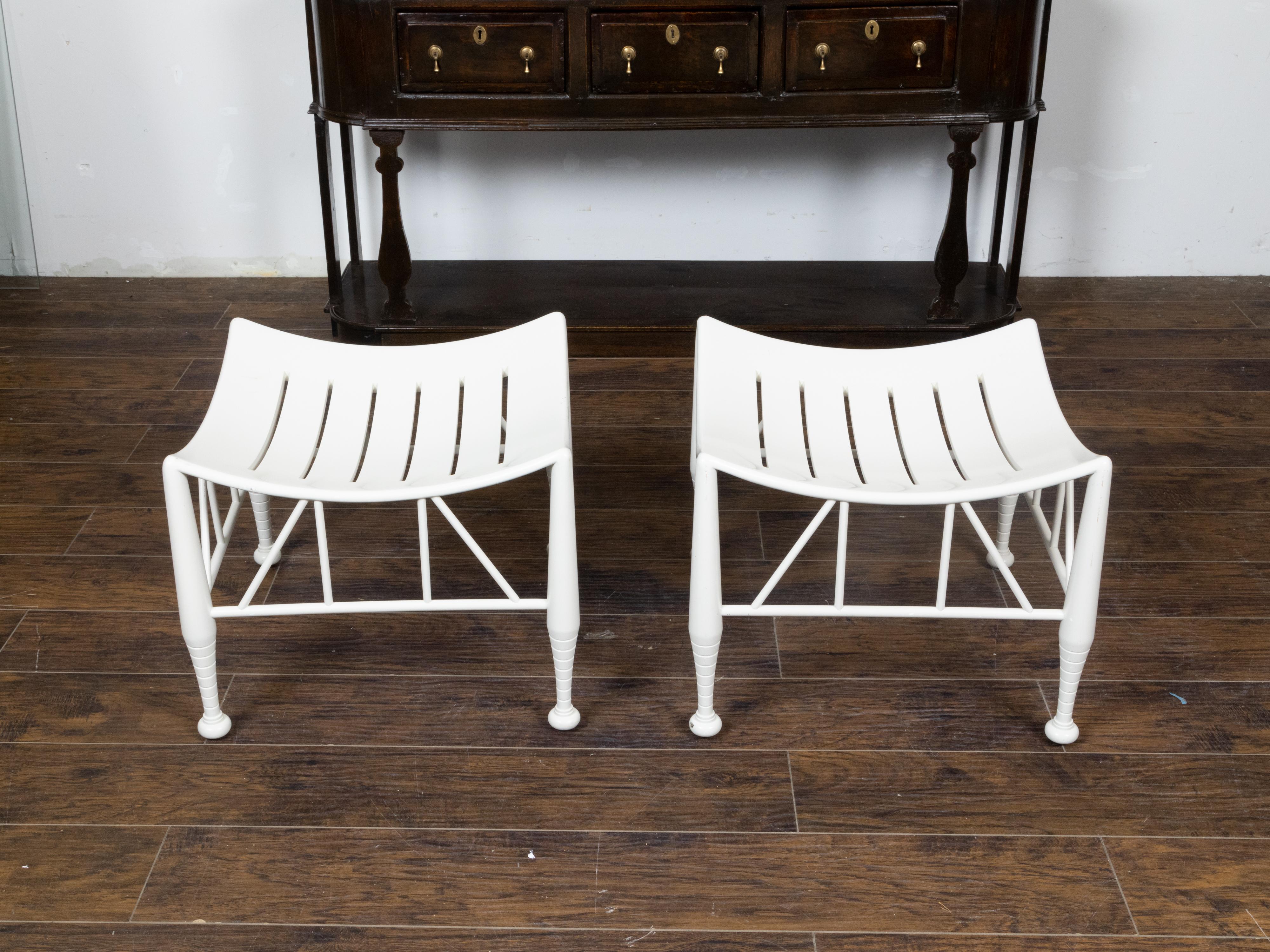 20th Century Pair of Vintage English Egyptian Revival White Thebes Stools with Curving Seats For Sale