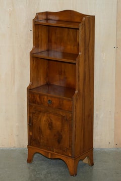 PAIR OF ViNTAGE ENGLISH FLAMED HARDWOOD WATERFALL BOOKCASES MIT CUPBOARD BASES