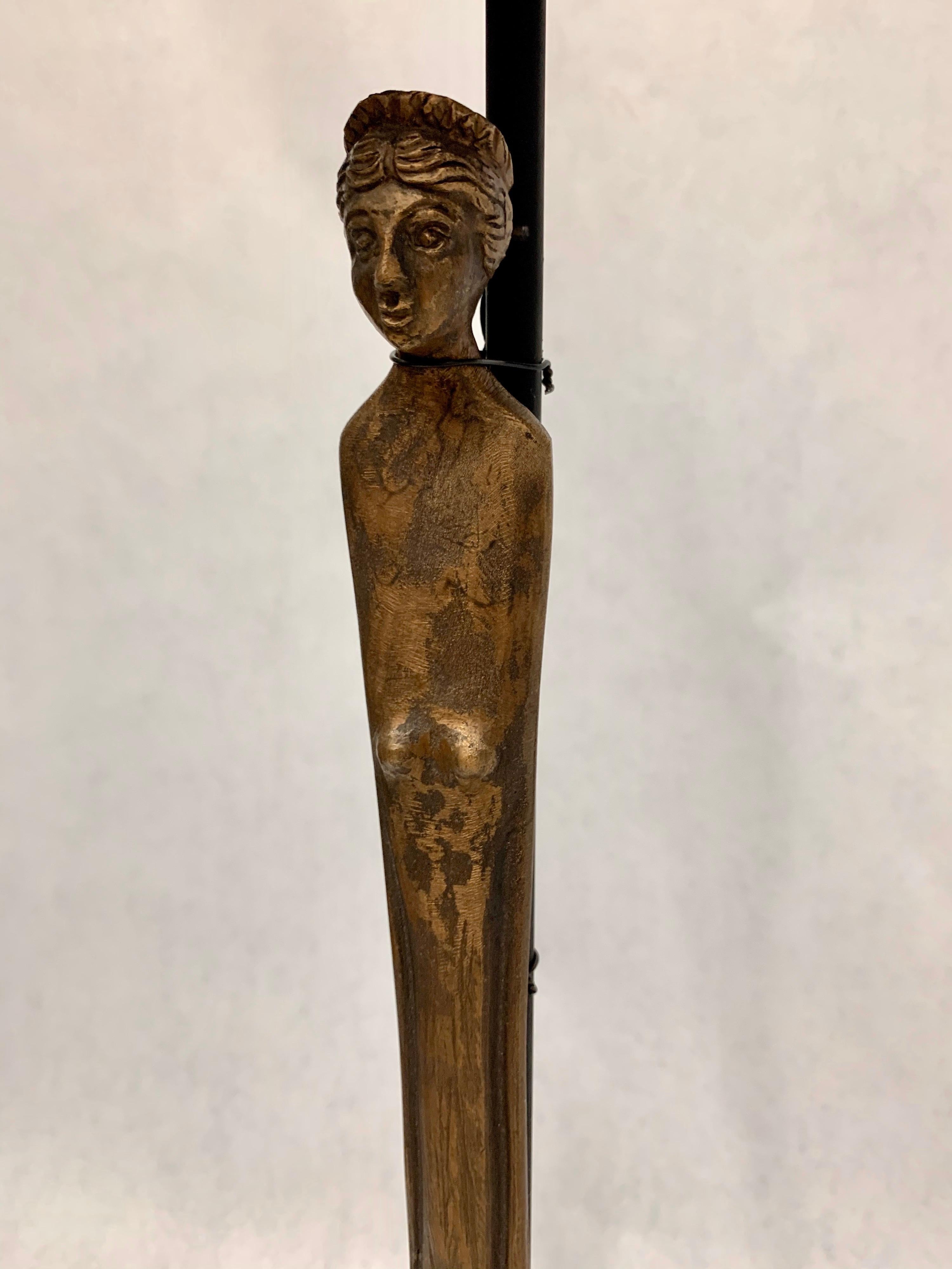 Patina on bronze hand forged Etruscan statues of women. Simple and heavy - custom designed base and shades, silk cable, rewired.