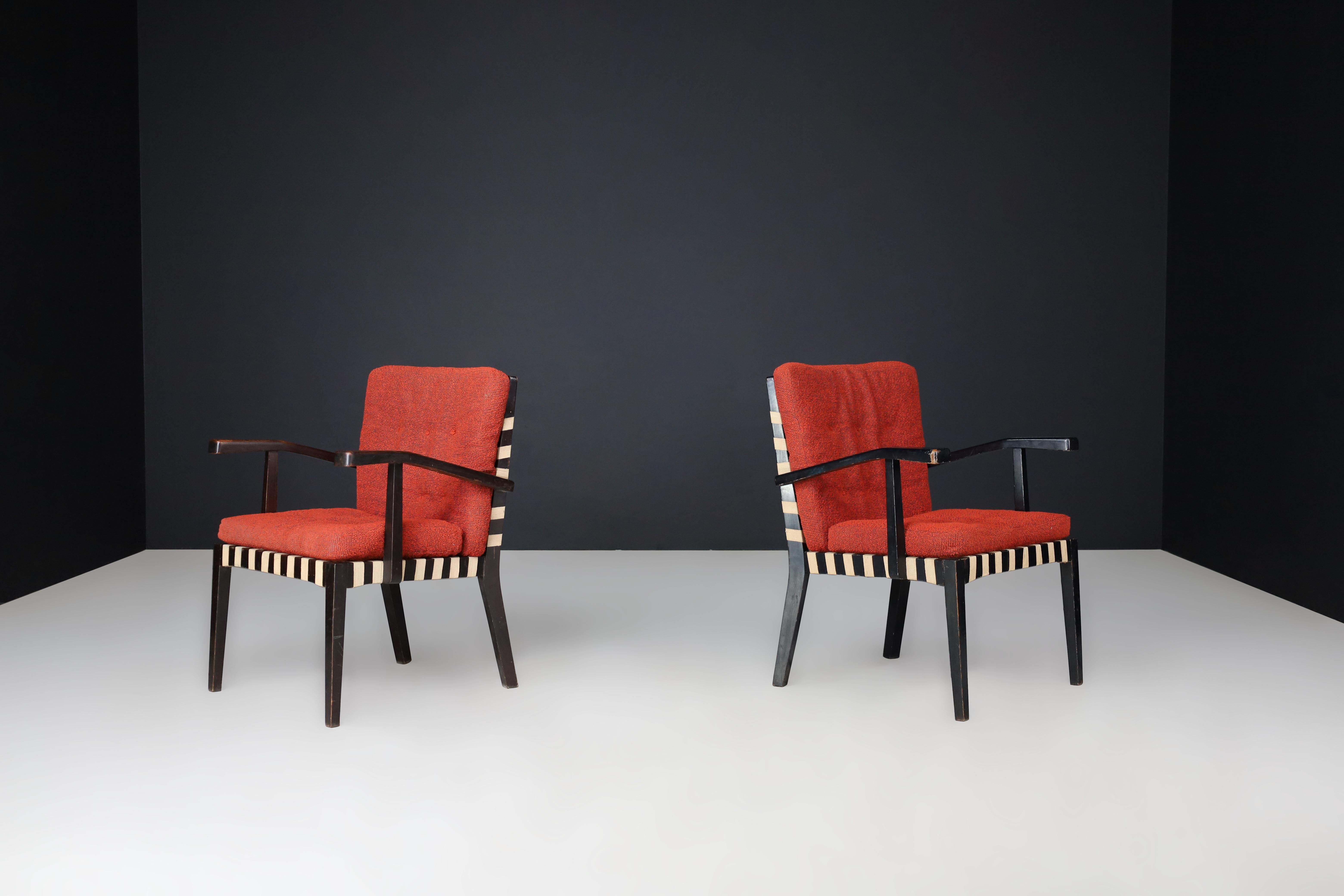 Pair of Vintage European Modernist Armchairs, c. 1930s–1950s

This elegant pair of armchairs reflects the refined transition between Art Deco aesthetics and the functional simplicity of early European Modernism. Likely crafted in Central or Eastern