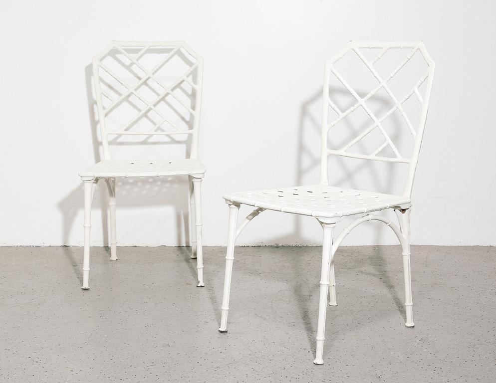 Lovely set of patio chairs in cast aluminum in a faux-bamboo style. Painted white.

Measures: 16