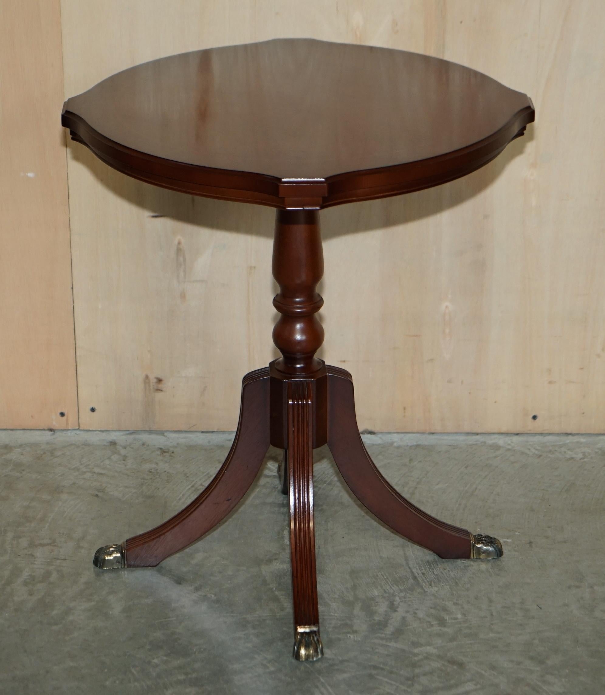 We are delighted to offer for sale this lovely pair of lightly restored vintage side tables in flamed mahogany with solid brass lions hairy paw feet

A very good looking well made and decorative pair of side tables, the lions hairy paw feet are