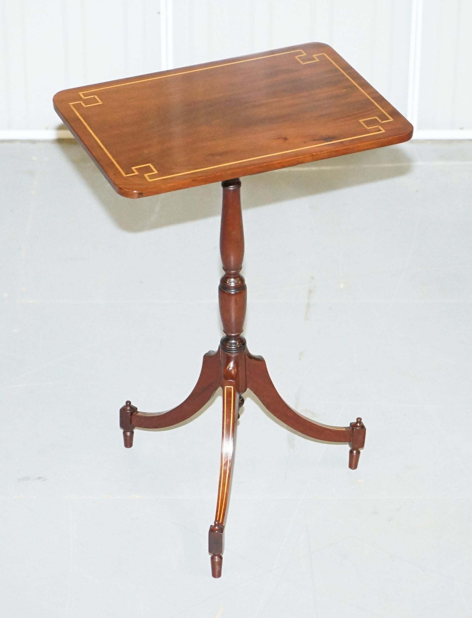 We are delighted to offer for sale this stunning pair of flamed walnut with box wood inlay lamp side tables

They are a very good looking well made and decorative piece, the tops have rich warm flamed walnut which glows in the right light 

We