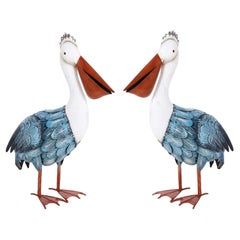 Coppia di sculture di pellicani in metallo dipinte in stile Folk Art d'epoca