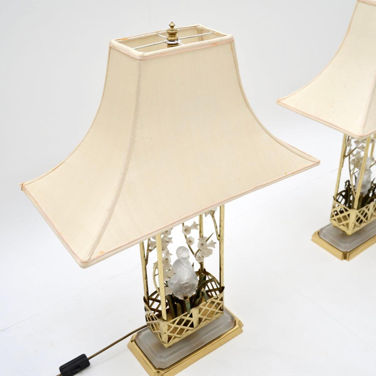 An absolutely stunning pair of vintage French brass and opaline glass table lamps by Maison Bagues, dating from around the 1970’s.

They are of exceptional quality, they are a large and impressive size. They are in the oriental style, with stunning