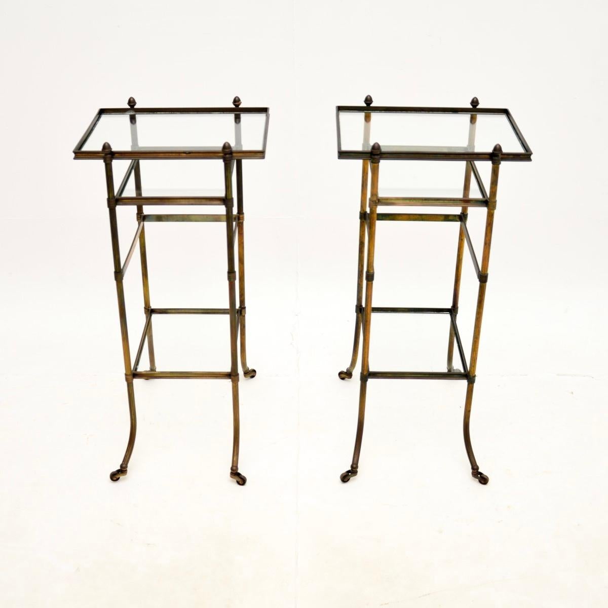 A beautiful pair of vintage French brass side tables, dating from around the 1960’s.

They are of superb quality and have an interesting design. They are nice and slim, perfect for use as side tables in a lounge or even as bedside tables. They have