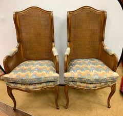 Pair of Vintage French Cane Wing Back Chairs