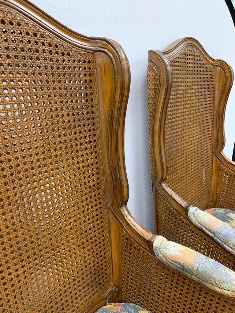 Pair of Vintage French Cane Wing Back Chairs at 1stDibs