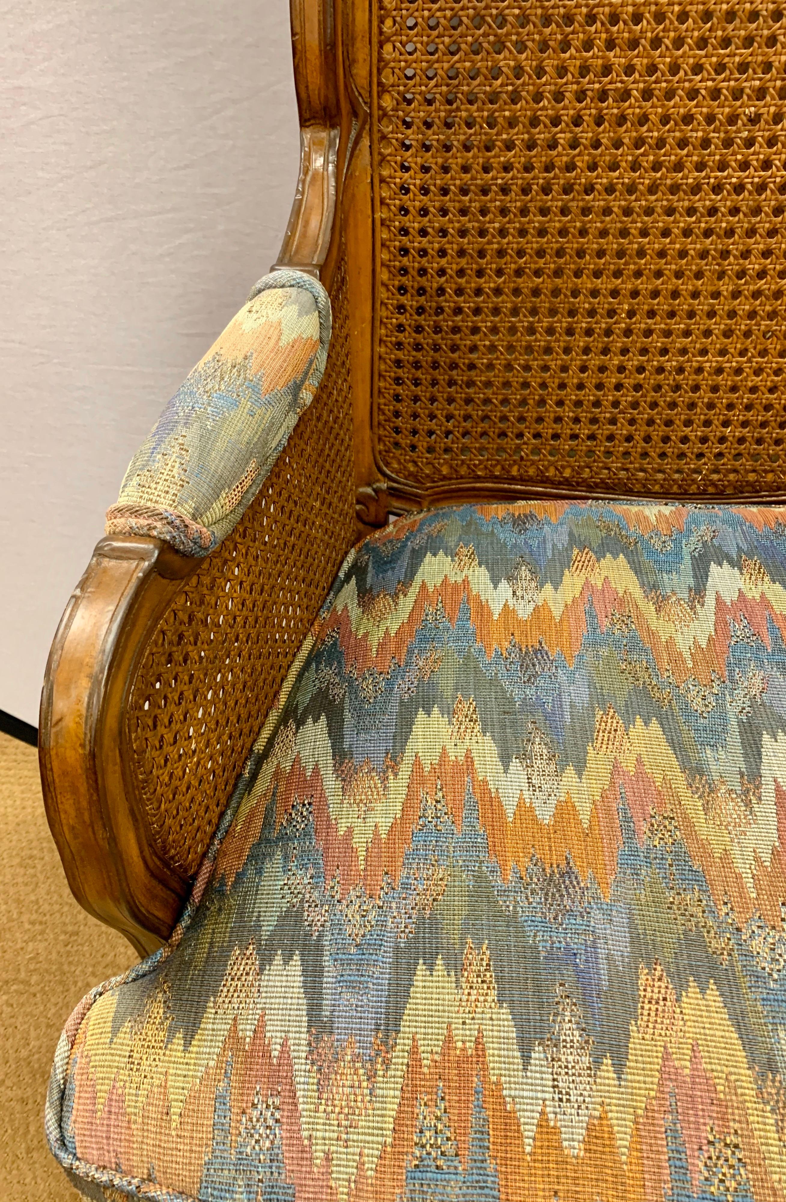 Pair of Vintage French Cane Wing Back Chairs In Good Condition In West Hartford, CT