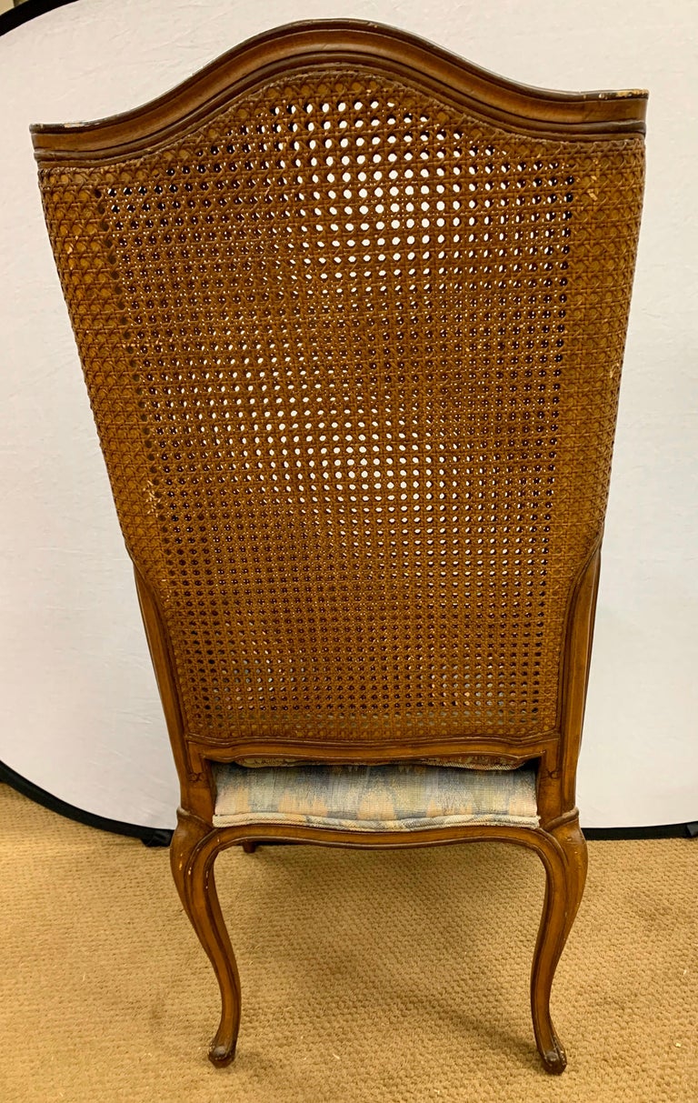 Pair of Vintage French Cane Wing Back Chairs at 1stDibs
