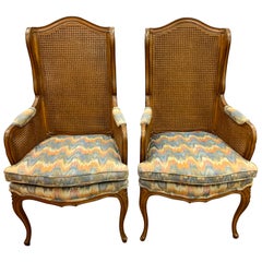 Pair of Vintage French Cane Wing Back Chairs