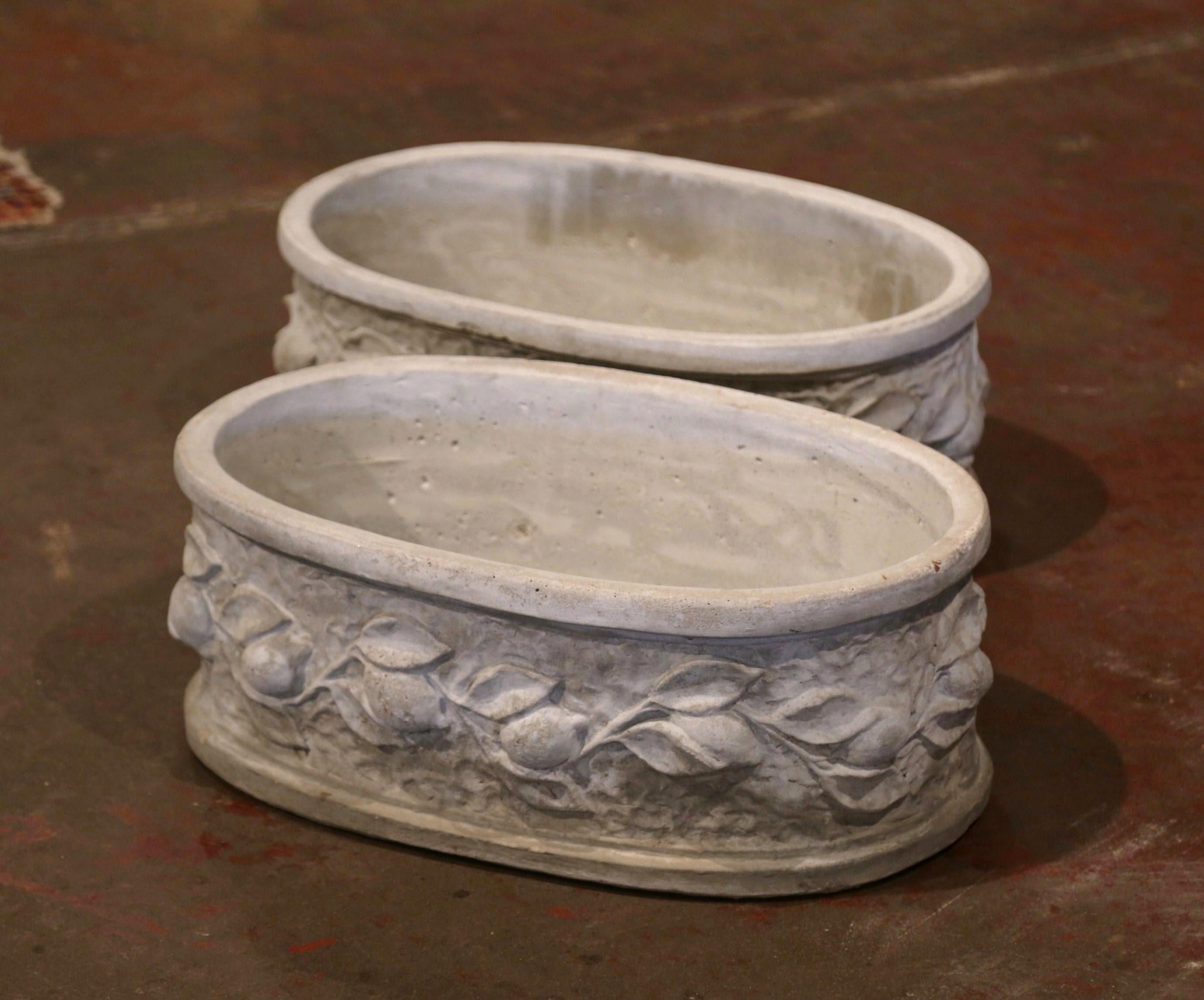 Patinated Pair of Vintage French Carved Oval Concrete Planters with Lemon and Leaf Decor