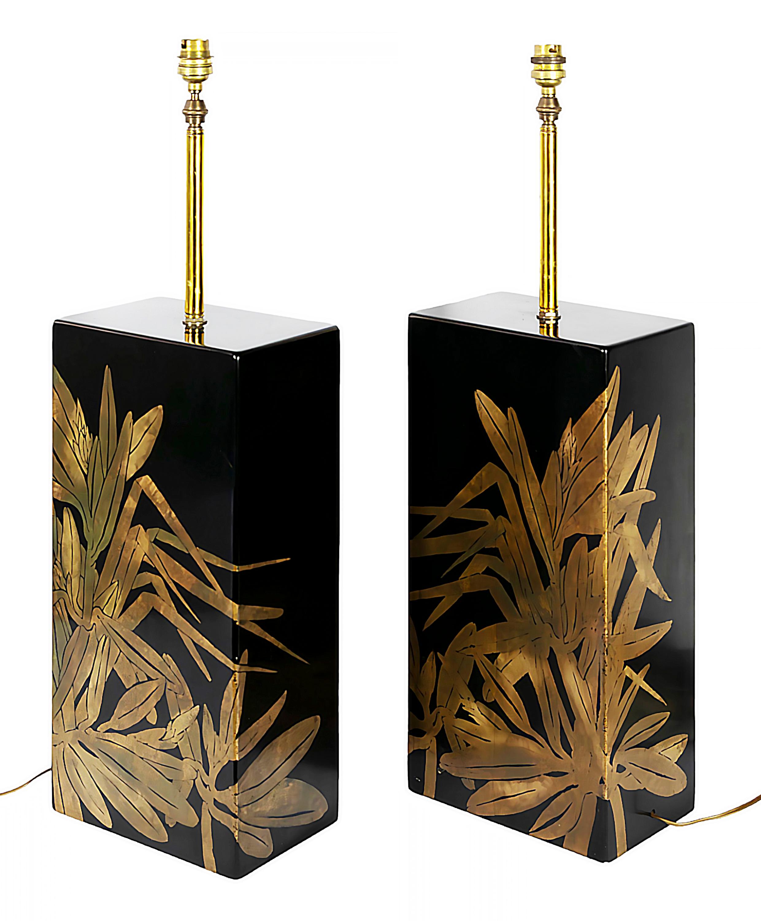 Pair of French table lamps in chinoiserie/oriental style, attributed to Jean Claude Mahey.
Each lamp is in black lacquered base with gold floral decor.
Shade are not included.


  