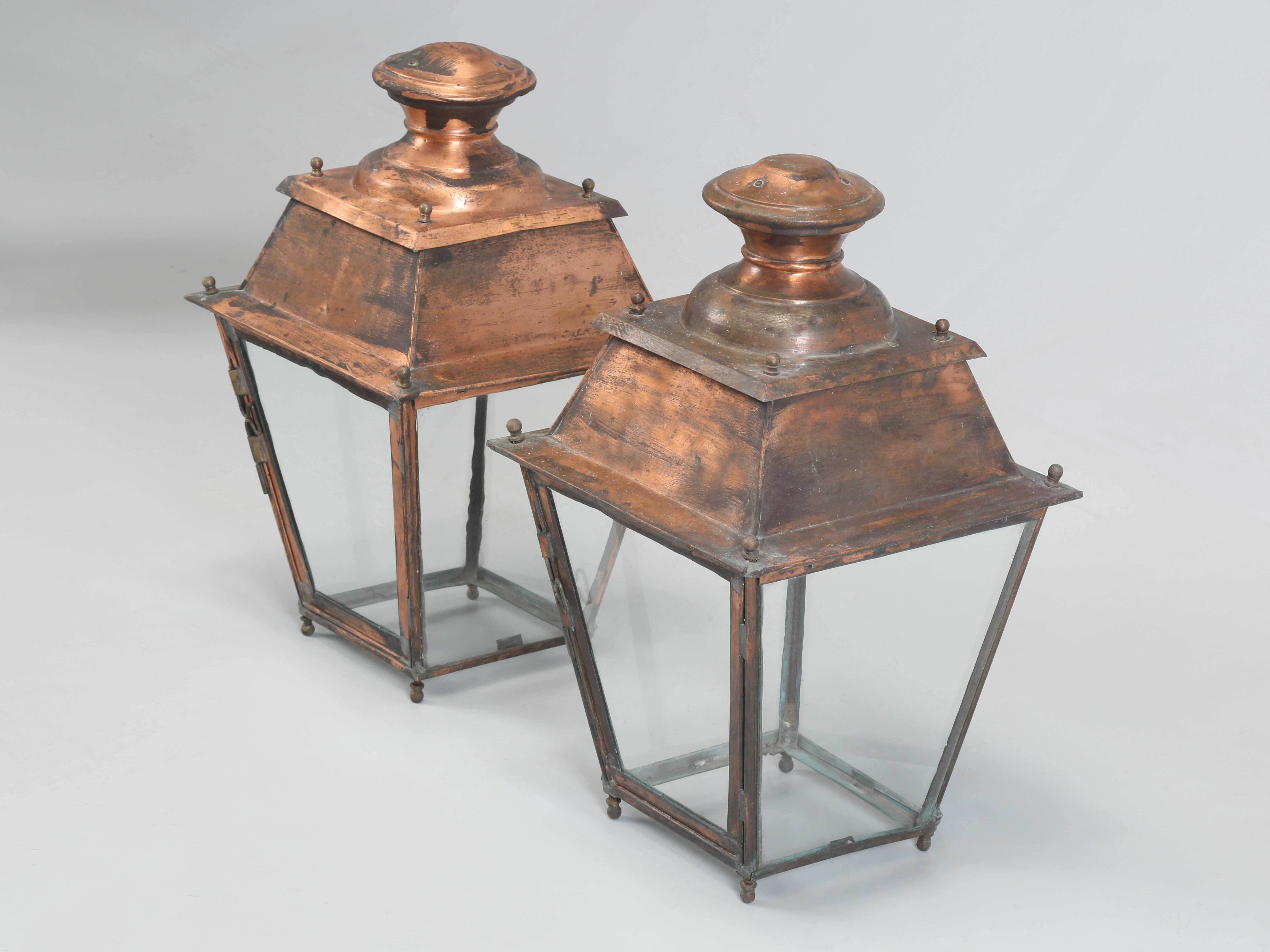 Pair of French Copper Vintage Lanterns that have not been restored or rewired. This pair of Vintage Copper French Lanterns just arrived from Toulouse and our workshop is so far behind in the restoration department, that we thought we might offer