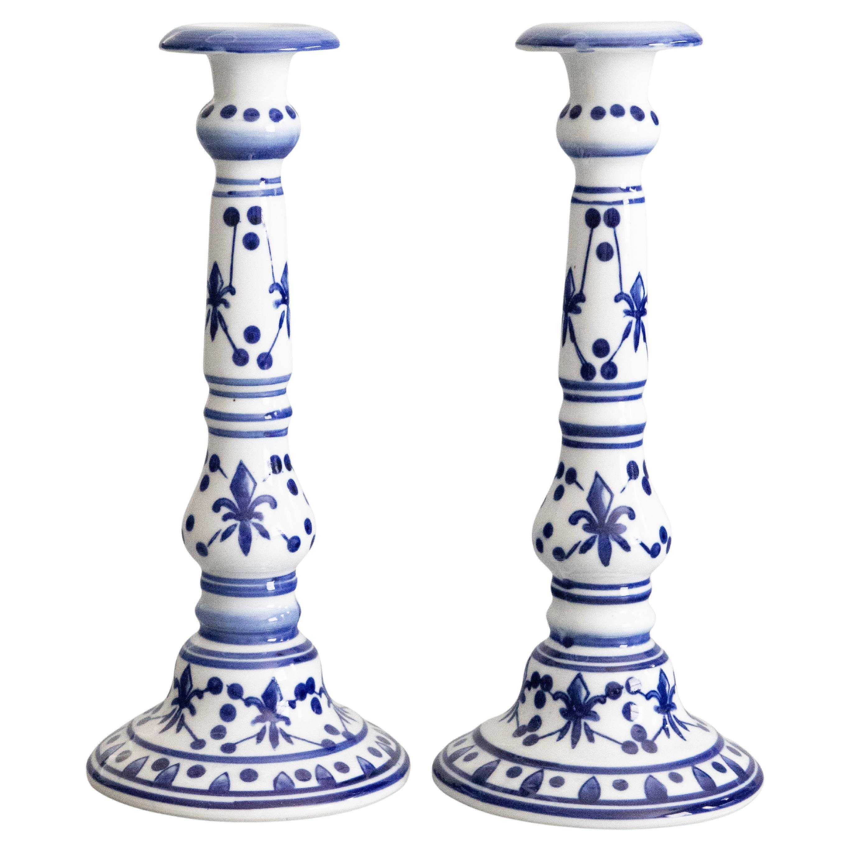 Pair of Vintage French Fleur-de-lis Blue & White Porcelain Candlesticks