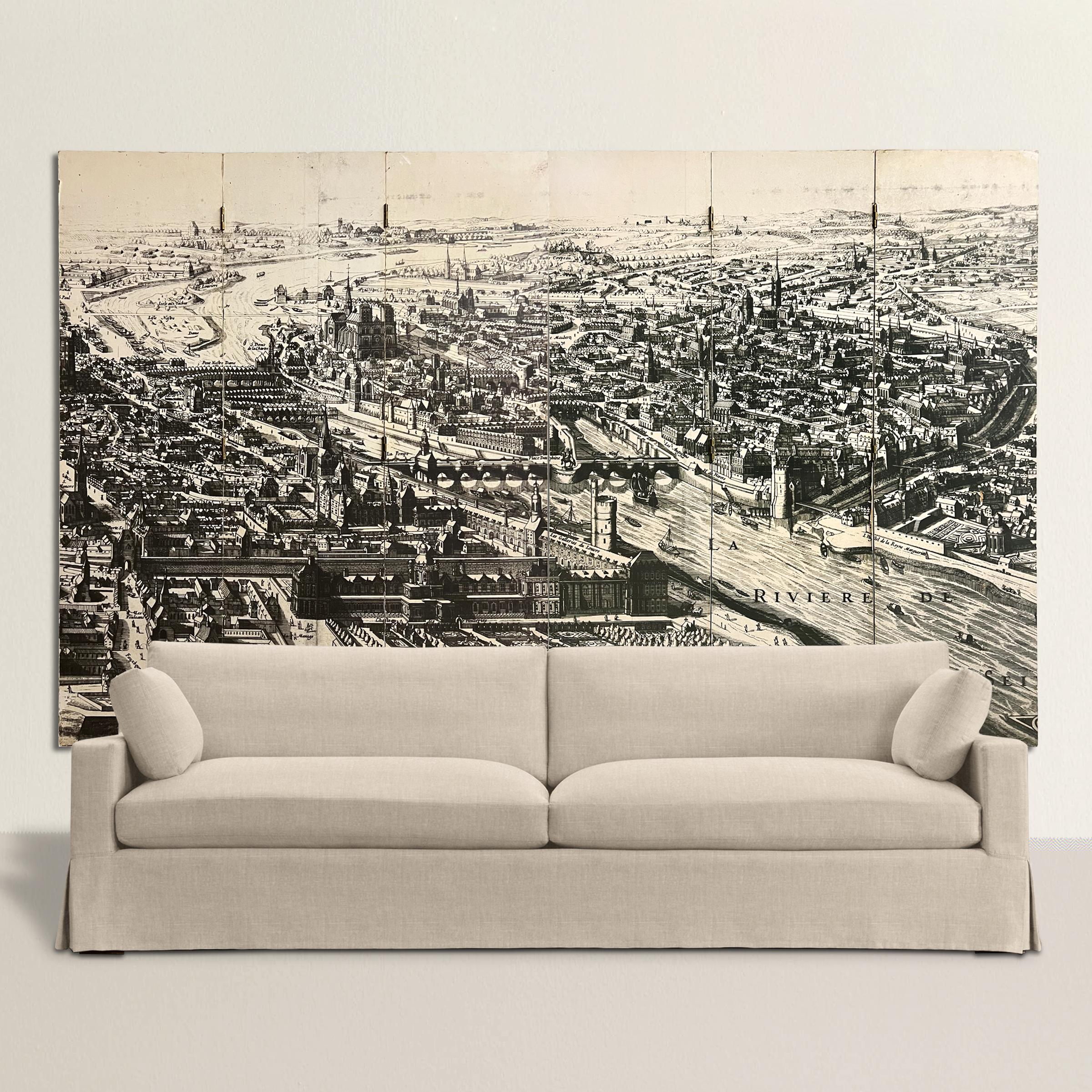 Transport yourself to the enchanting streets of 18th century Paris with this pair of vintage French folding screens that come together to form an exquisite aerial map of the city. Executed in a style reminiscent of Fornasetti, these screens