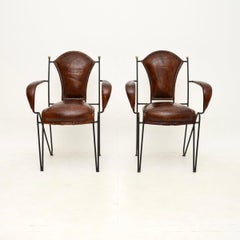 Coppia di poltrone francesi d'epoca in ferro e pelle