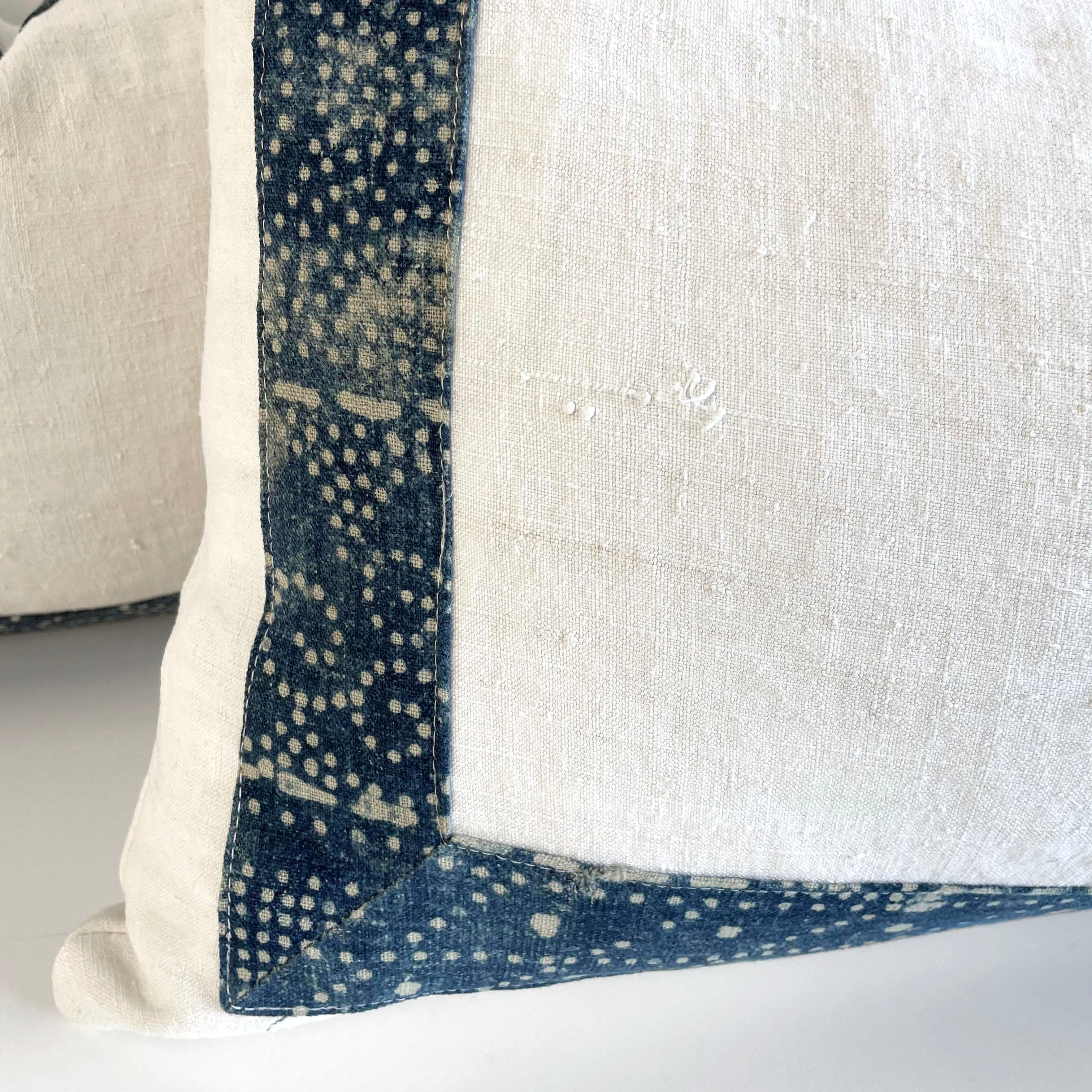 Vintage custom made French white and blue batik accent pillow with down feather insert. This vintage textile pillow face features a white vintage front with blue batik boarder. The back is also in white vintage linen. Our pillows are constructed