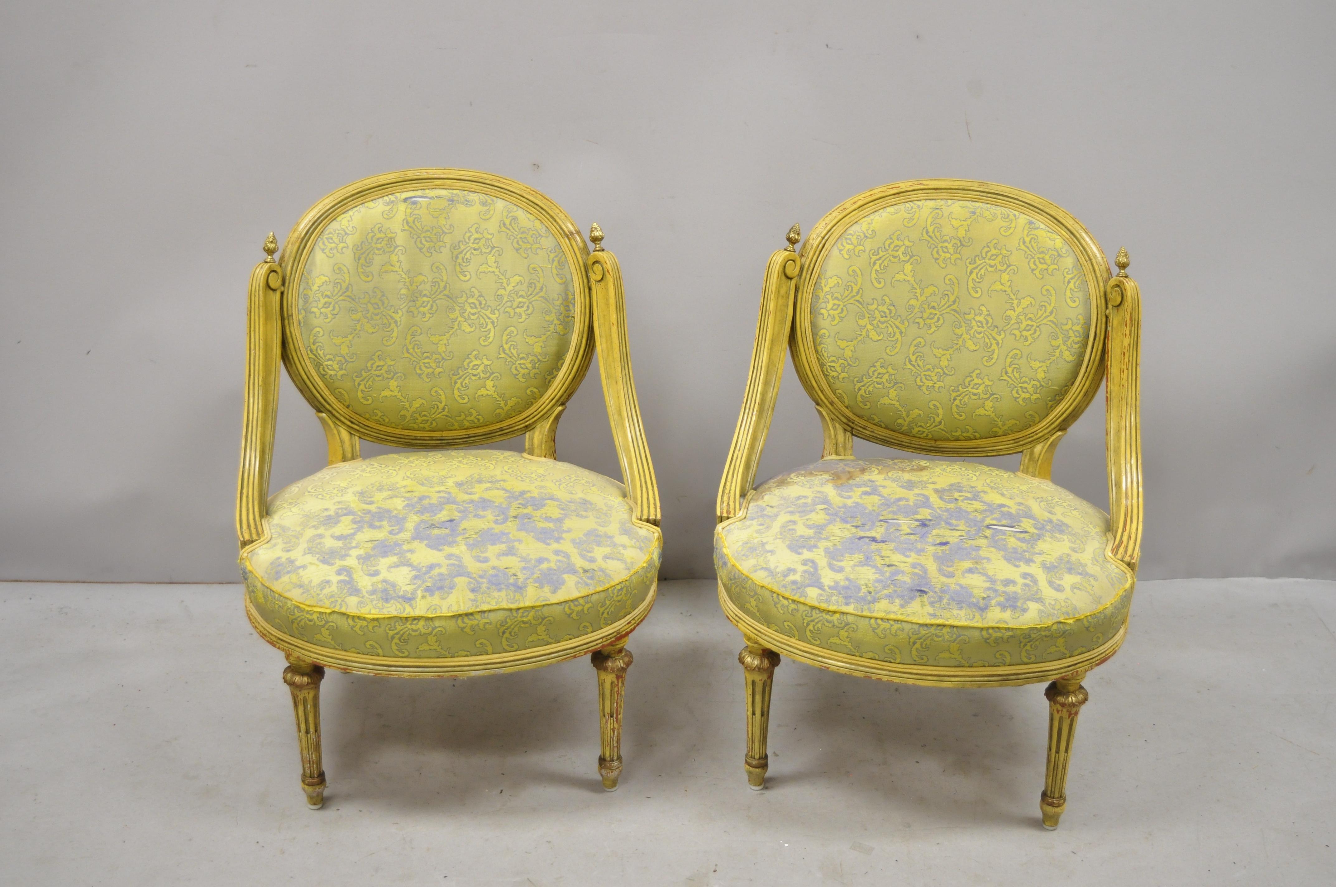 Pair of vintage French Louis XVI style low Petite Boudoir small Hiprest chairs. Item features low profile frames, brass finials, tapered legs, great style and form, circa early 20th century. Measurements: 30.5