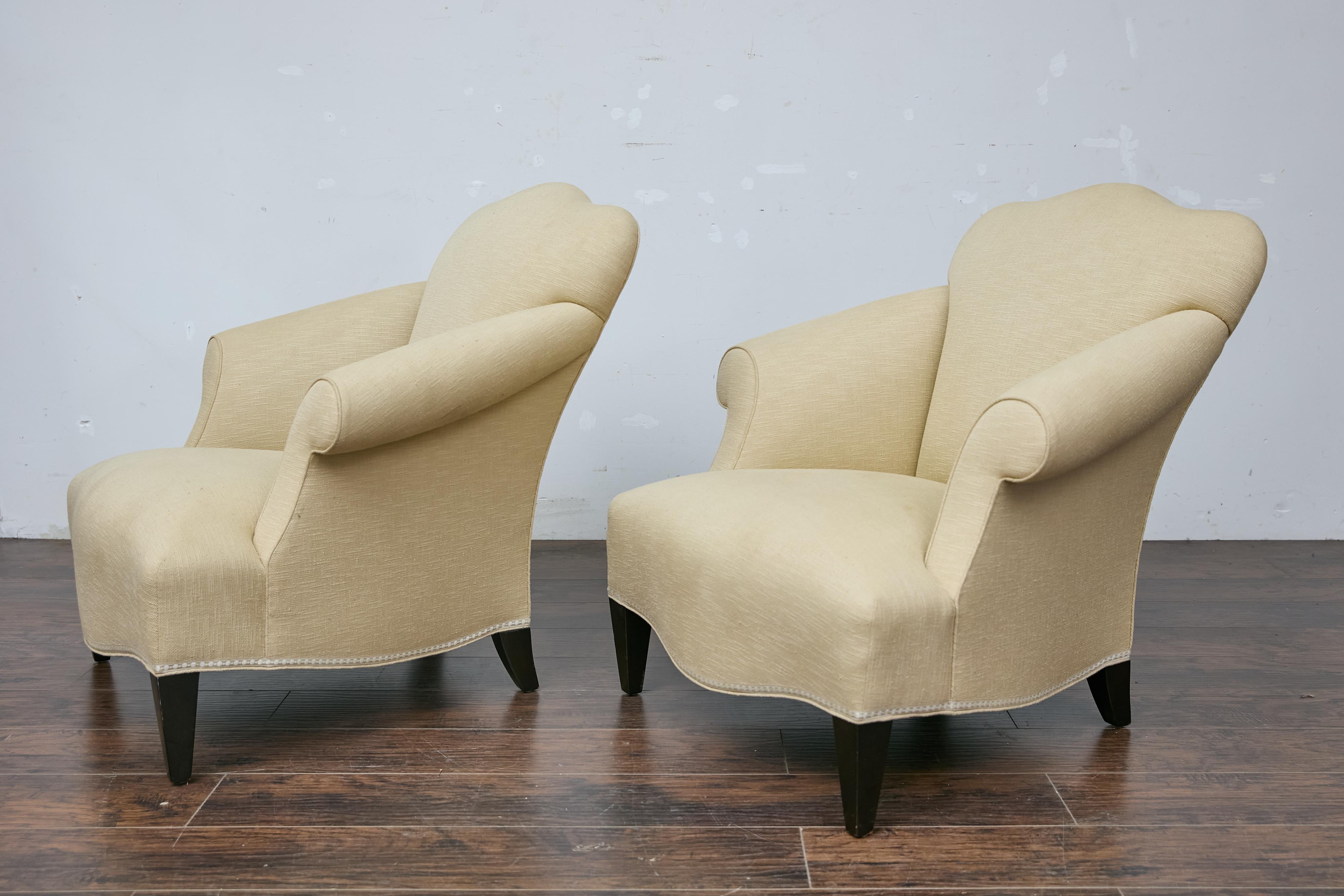 20th Century Pair of Vintage French Lounge Chairs with Camelbacks, Rolled Arms, Ebonized Legs For Sale