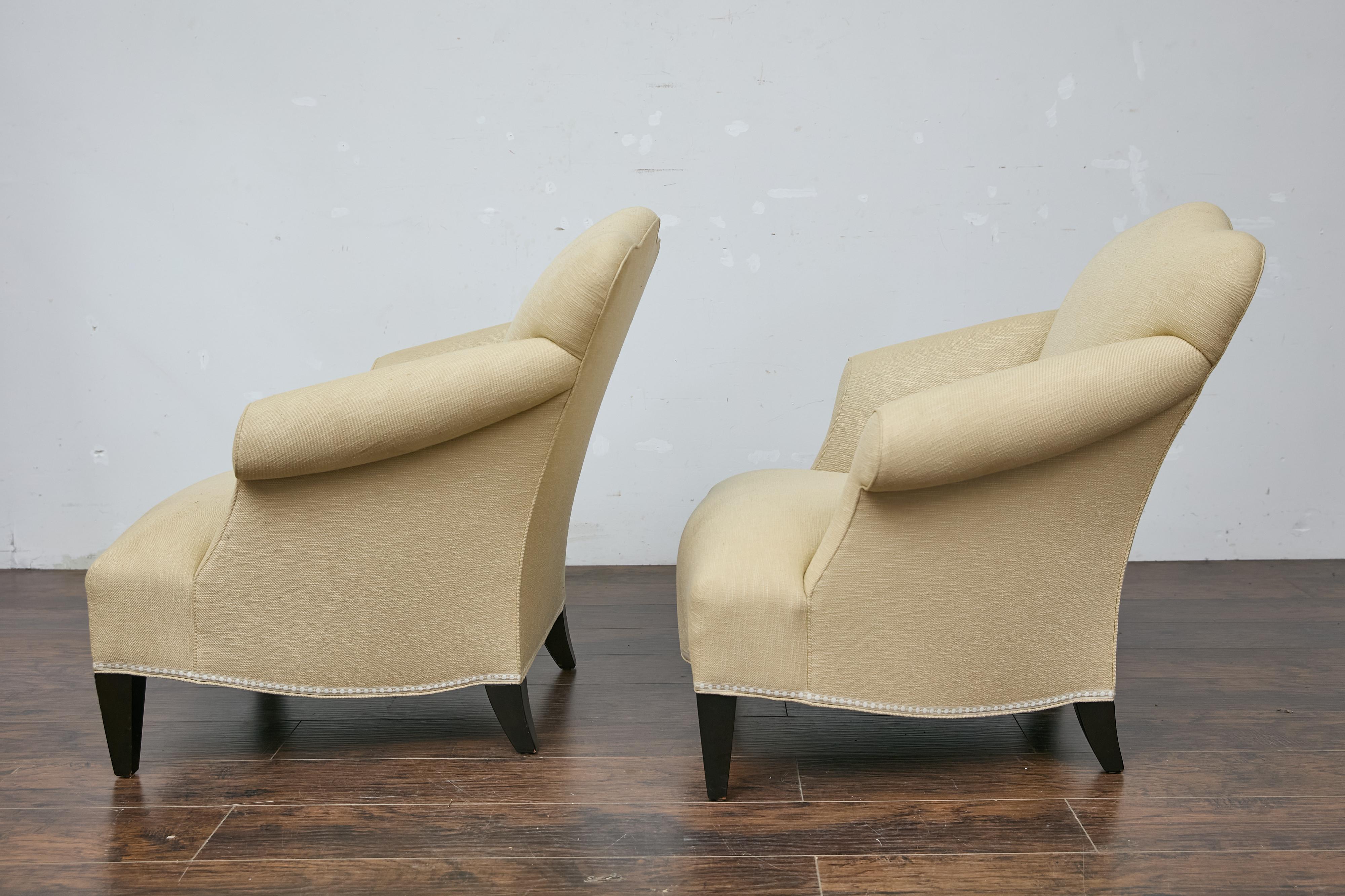 Upholstery Pair of Vintage French Lounge Chairs with Camelbacks, Rolled Arms, Ebonized Legs For Sale