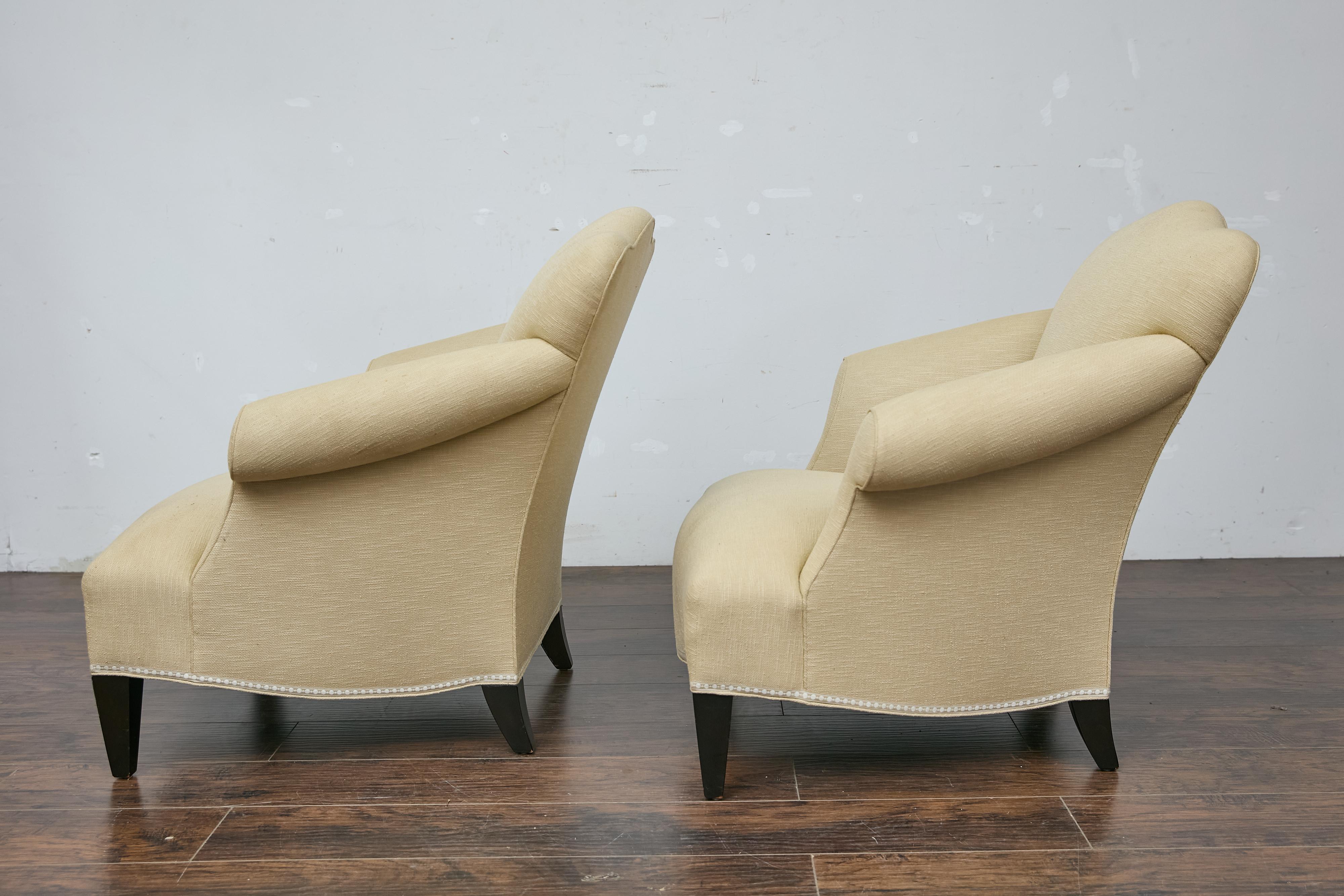Pair of Vintage French Lounge Chairs with Camelbacks, Rolled Arms, Ebonized Legs For Sale 1