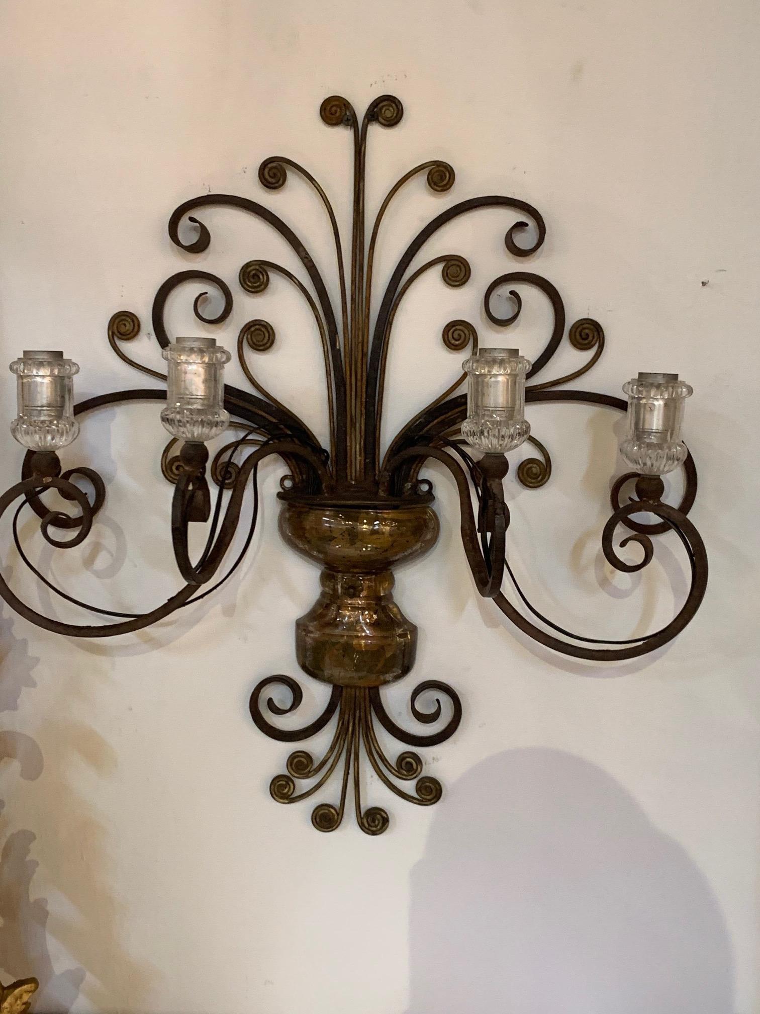 Lovely pair of vintage French Maison Baguès iron and foil glass wall sconces with 4 lights. Beautiful scrolling pattern on these. So pretty!!