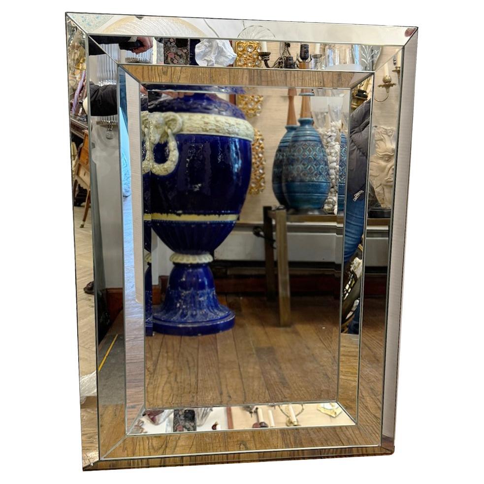 Pair of Vintage French Mirrors with Beveled Frames. Sold Individually.