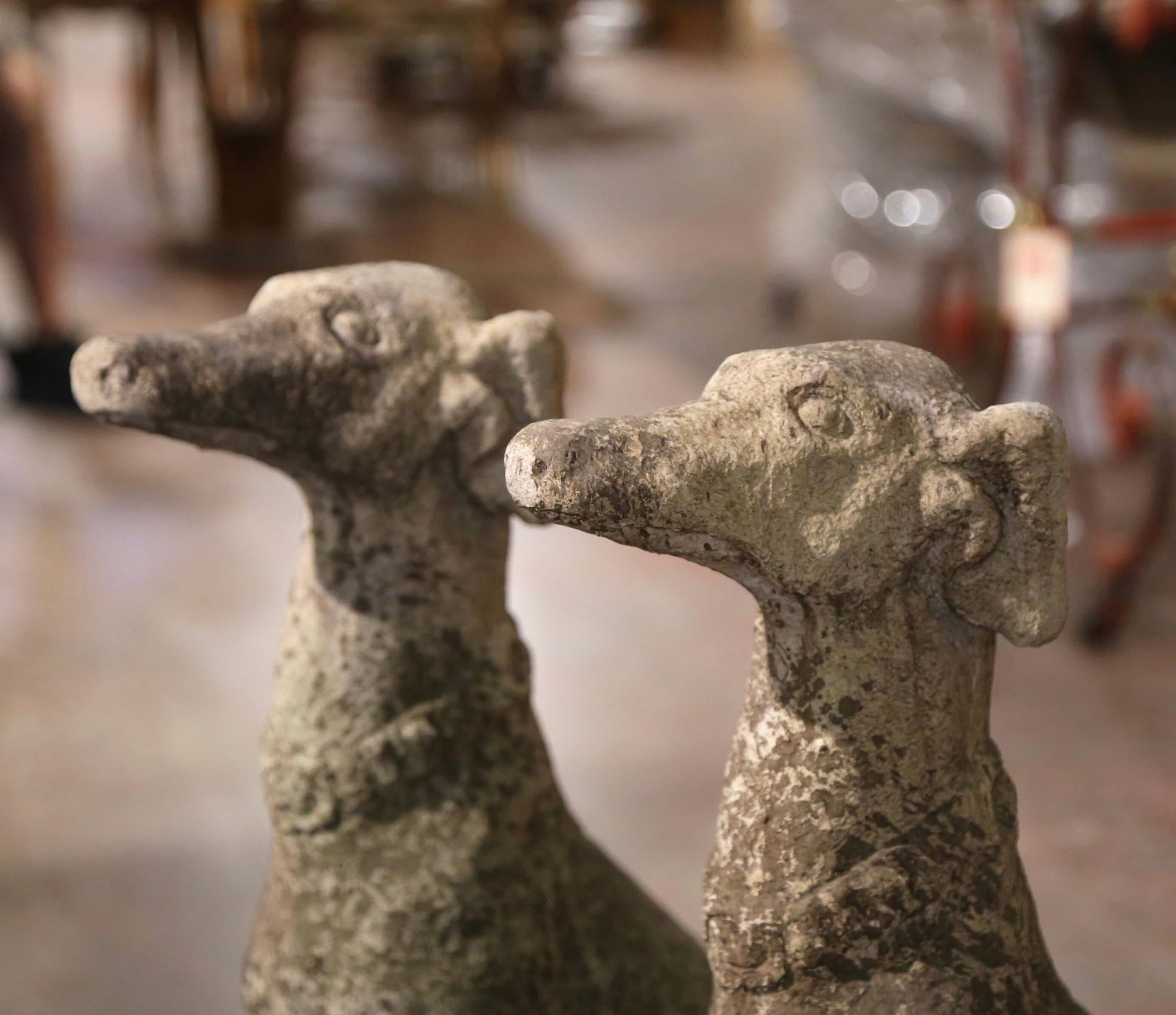 Pair of Vintage French Outdoor Weathered Carved Stone Greyhound Dog Sculptures In Excellent Condition In Dallas, TX