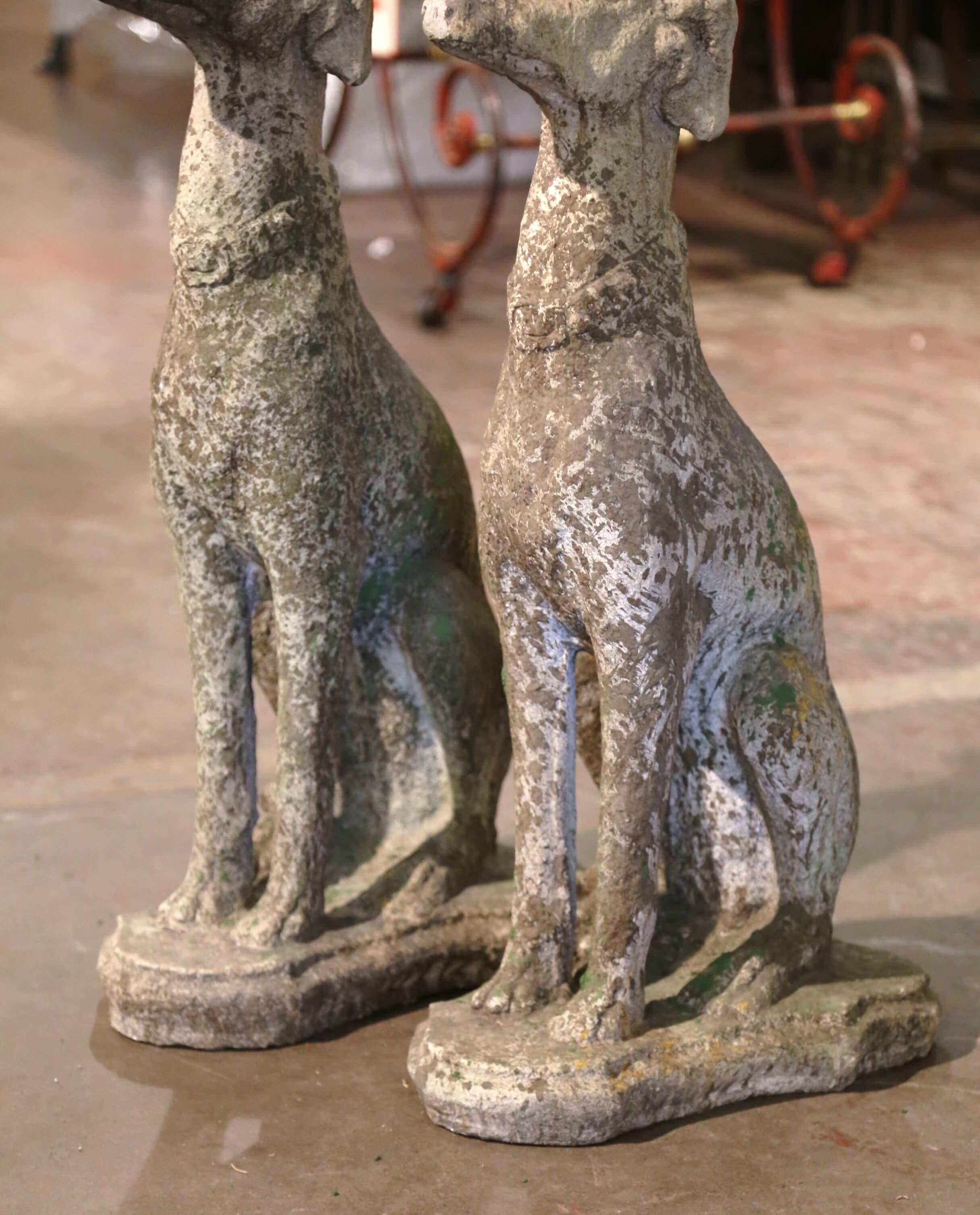 Contemporary Pair of Vintage French Outdoor Weathered Carved Stone Greyhound Dog Sculptures For Sale