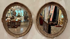 Pair of Vintage French Oval Silver Leaf Gesso Mirrors