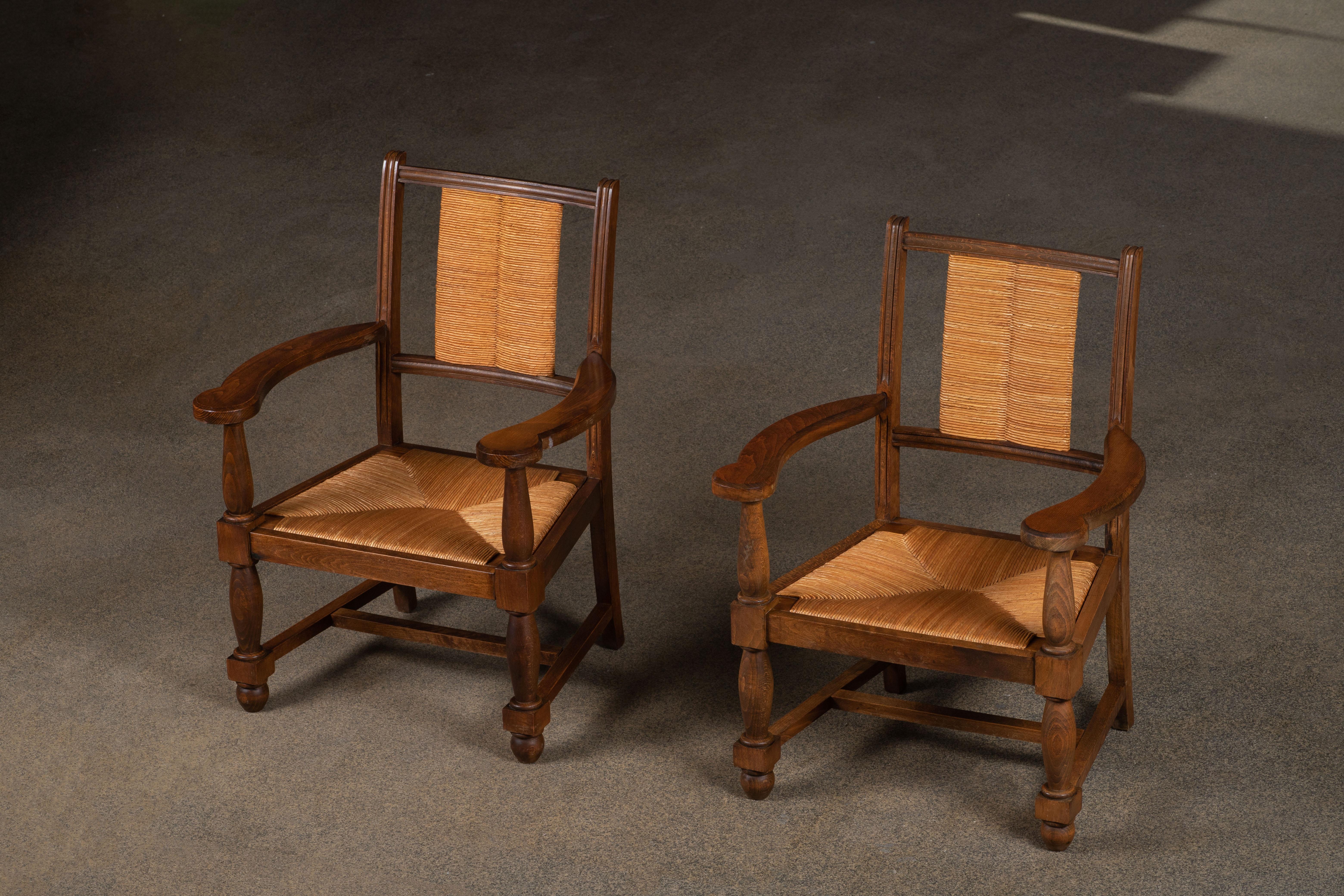 Milieu du XXe siècle Paire de fauteuils français vintage en jonc dans le style de Francis Jourdain en vente