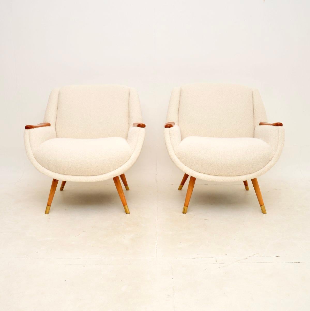 A stylish and very comfortable pair of vintage French satin wood armchairs. They were recently imported from France, they date from the 1950-60’s.

They are extremely well made, the quality is outstanding. The frames are well sprung and generous to