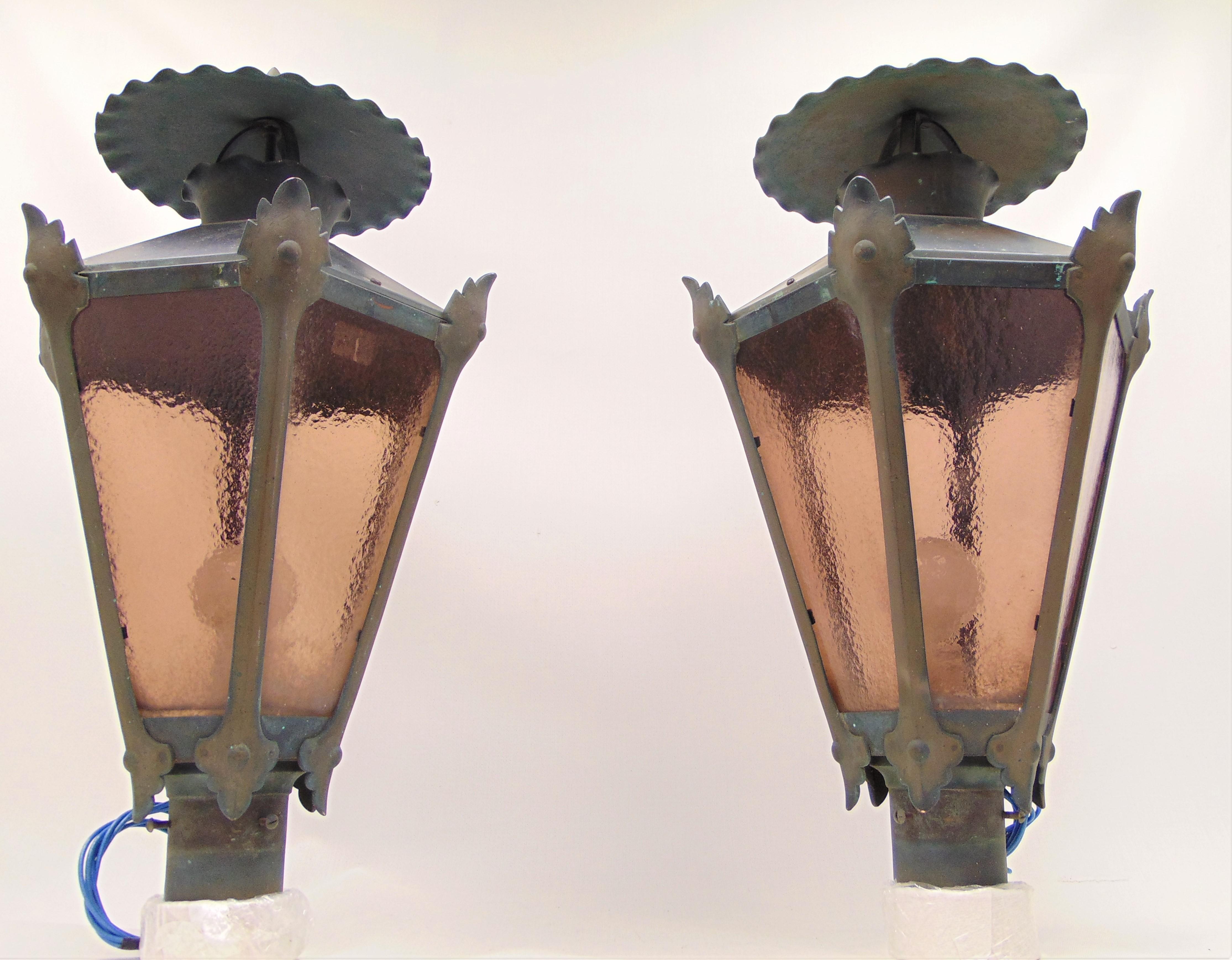 Vintage copper French style outdoor lanterns. They have just been re-wired. They measure: 29” H x 18” W x 18” D. The base is nearly 4”.  Listed for sale individually.  The pair is available.  