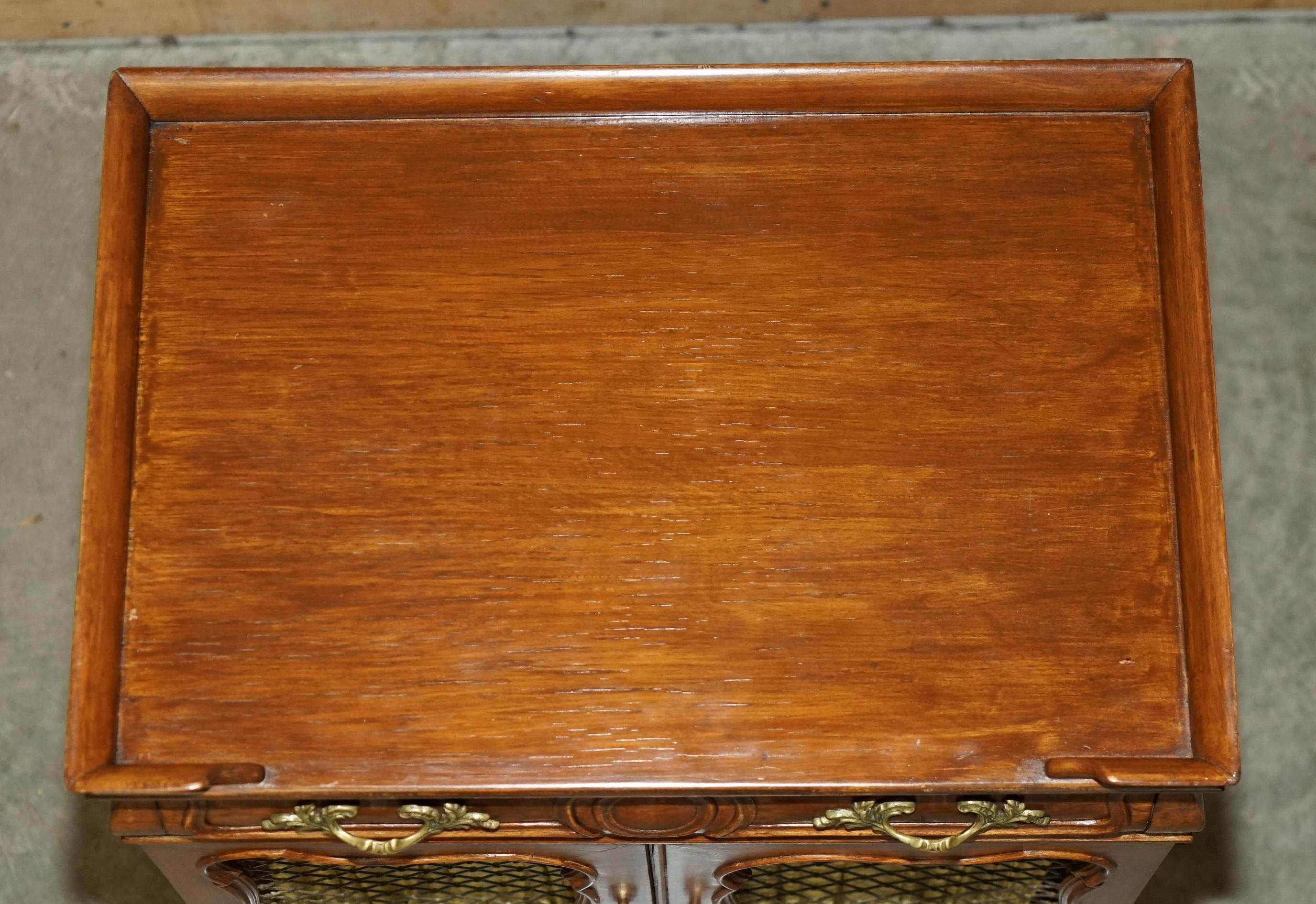 French PAIR OF VINTAGE FRENCH WALNUT PIERCED BRASS & SILK SIDE CABINETS WiTH DRAWERS For Sale