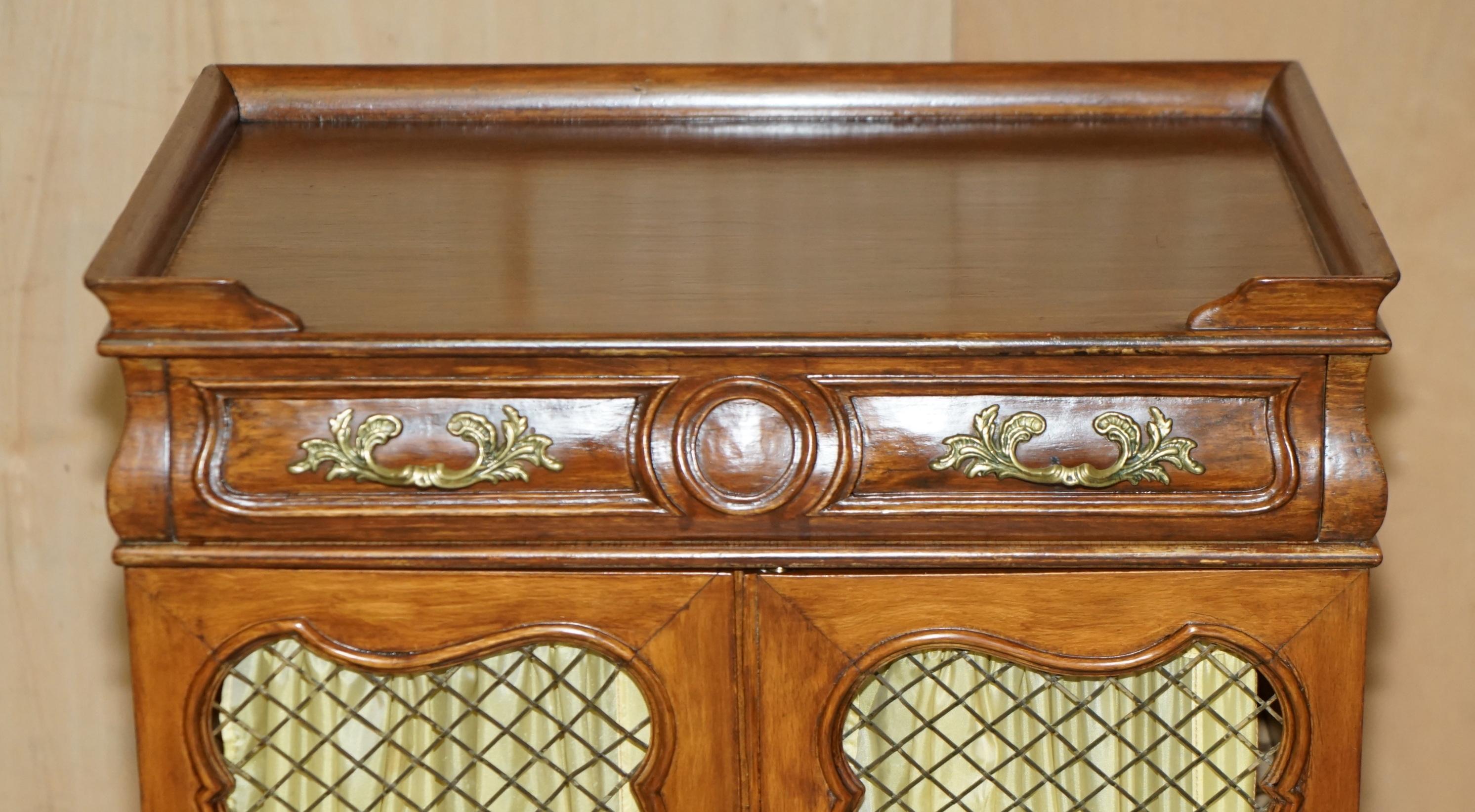 Hand-Crafted PAIR OF VINTAGE FRENCH WALNUT PIERCED BRASS & SILK SIDE CABINETS WiTH DRAWERS For Sale