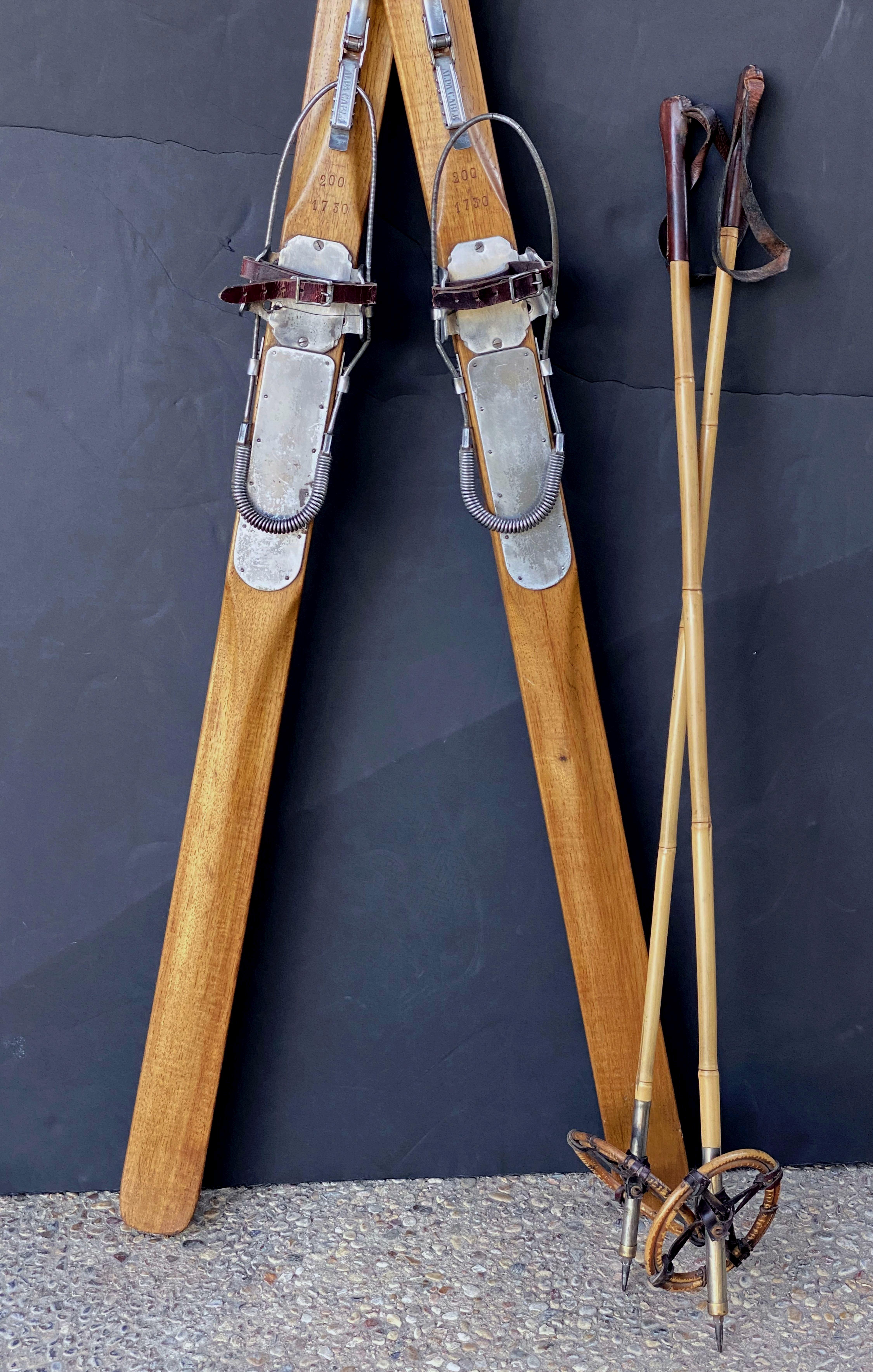 Pair of Vintage French Wooden Skis with Bamboo Skiing Poles In Good Condition In Austin, TX