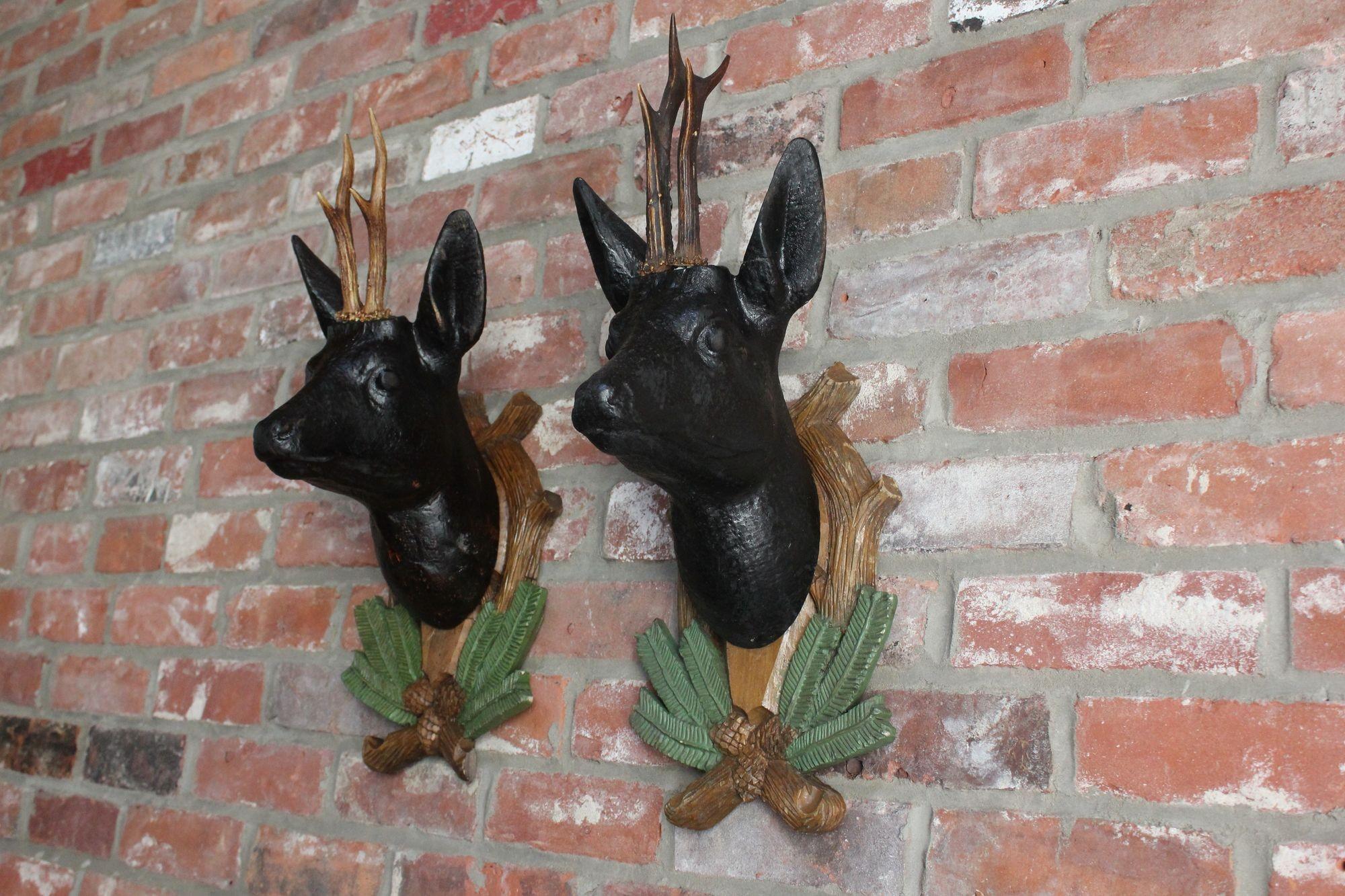 Mid-20th Century Pair of Vintage German Carved Black Forest Mounted Deer Wall Sculptures For Sale