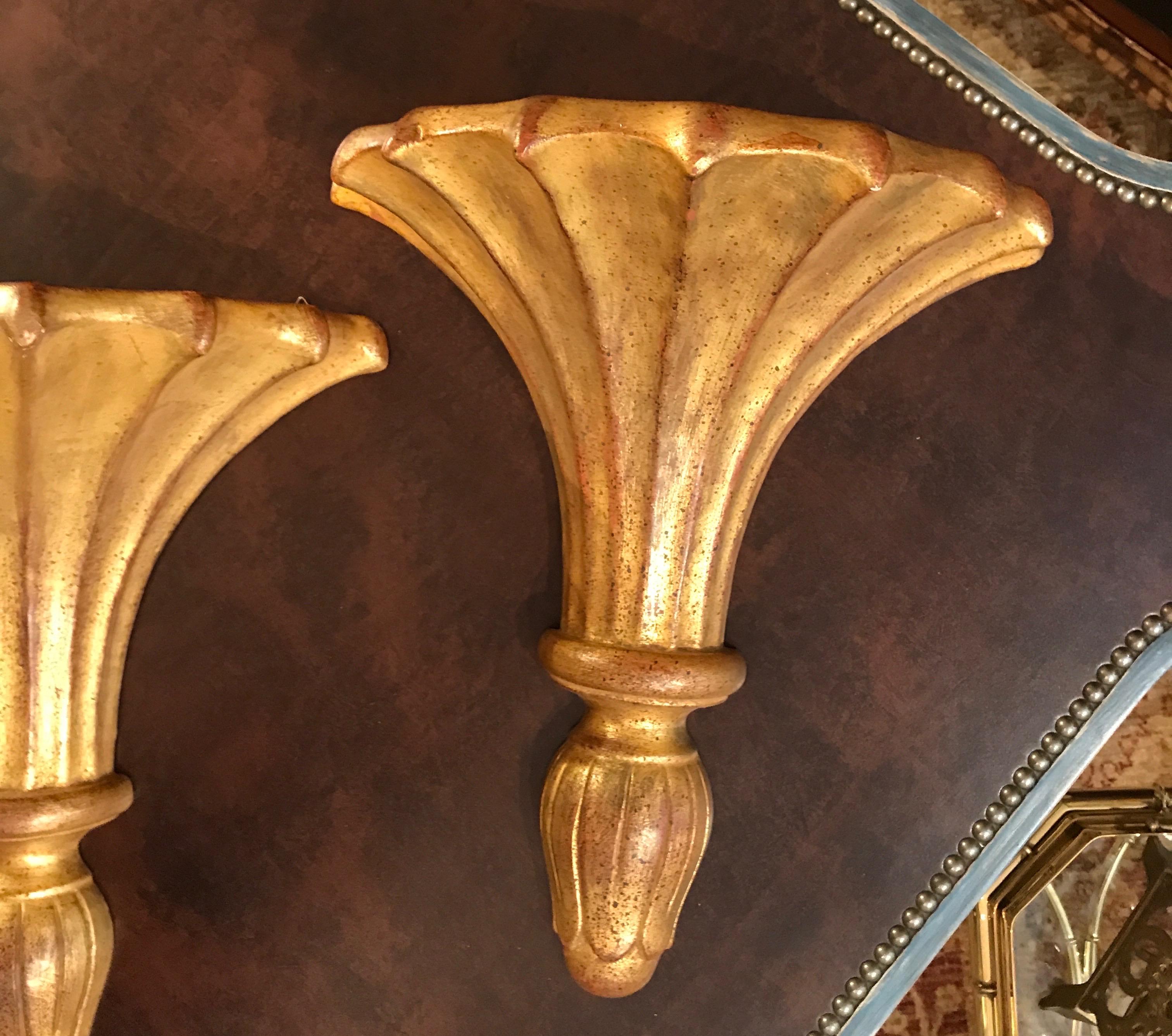 Pair of large gilded wood Italian wall brackets.