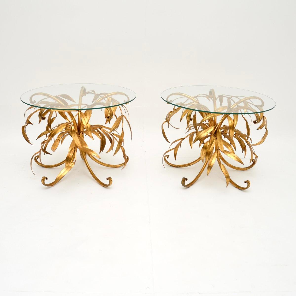 A gorgeous pair of vintage gilt metal side tables by Hans Kogl, made in Germany and dating from the 1960’s.

They are beautifully designed and are of wonderful quality. The frames have gorgeous foliage designs and are finished in gold, they support