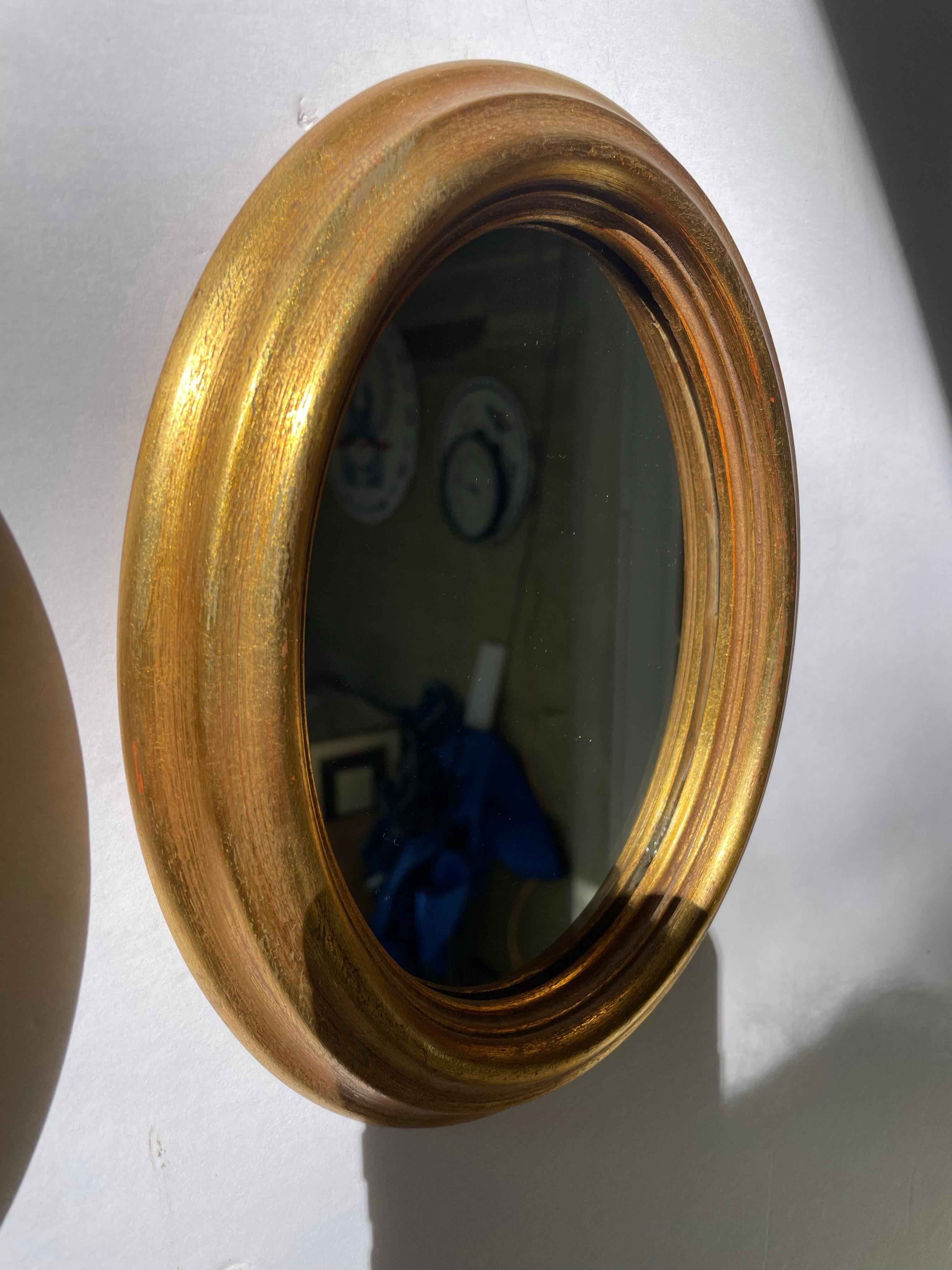 Paire de miroirs italiens ovales dorés vintage 8