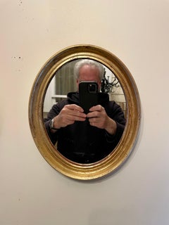 Pair of Vintage Gilt Oval Italian Mirrors