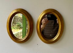 Pair of Vintage Gilt Oval Italian Mirrors