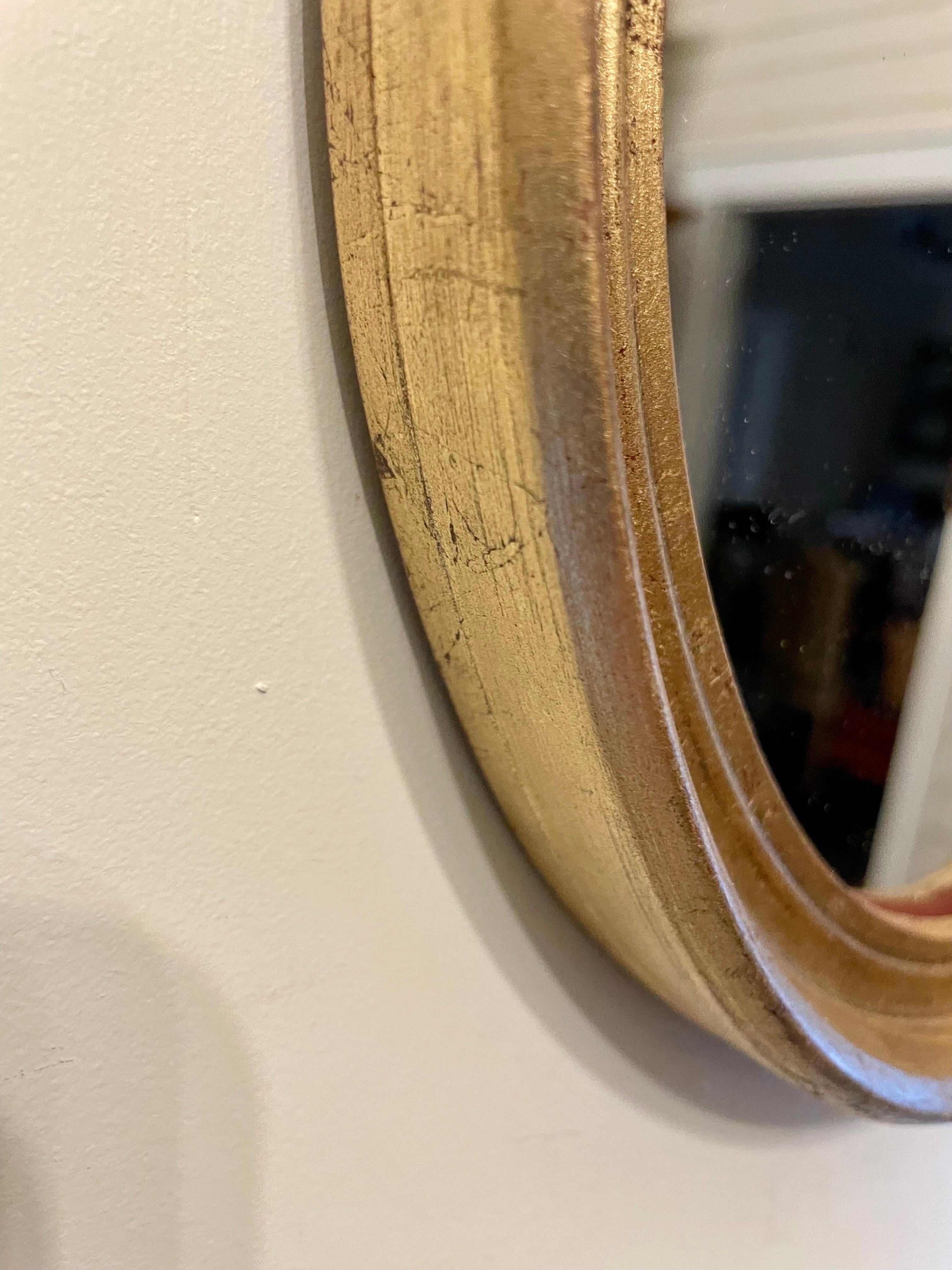 Pair of Vintage Gilt Oval Italian Mirrors 1