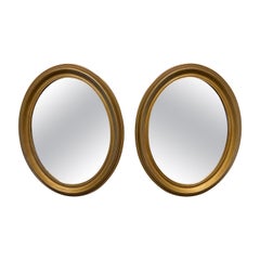 Pair of Vintage Gilt Oval Italian Mirrors Pair of Vintage Gilt Oval Italian Mirrors
