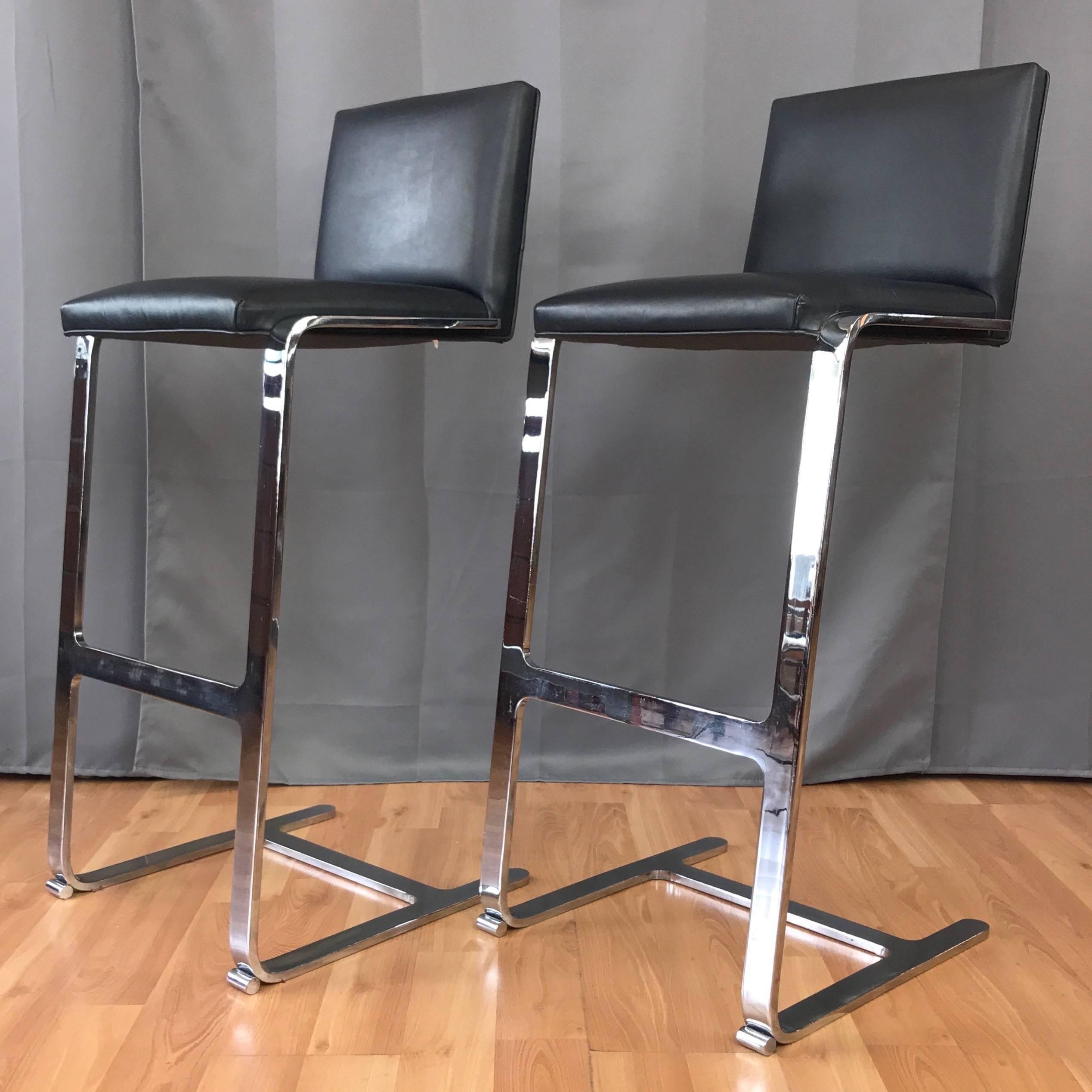 A late-1980s pair of Ludwig Mies van der Rohe-inspired minimalist chrome and leather 503 MV barstools by Gordon International.

Perfectly echoes the cantilevered design of Mies van der Rohe’s iconic Brno chair, with a seamless mirror finish chrome