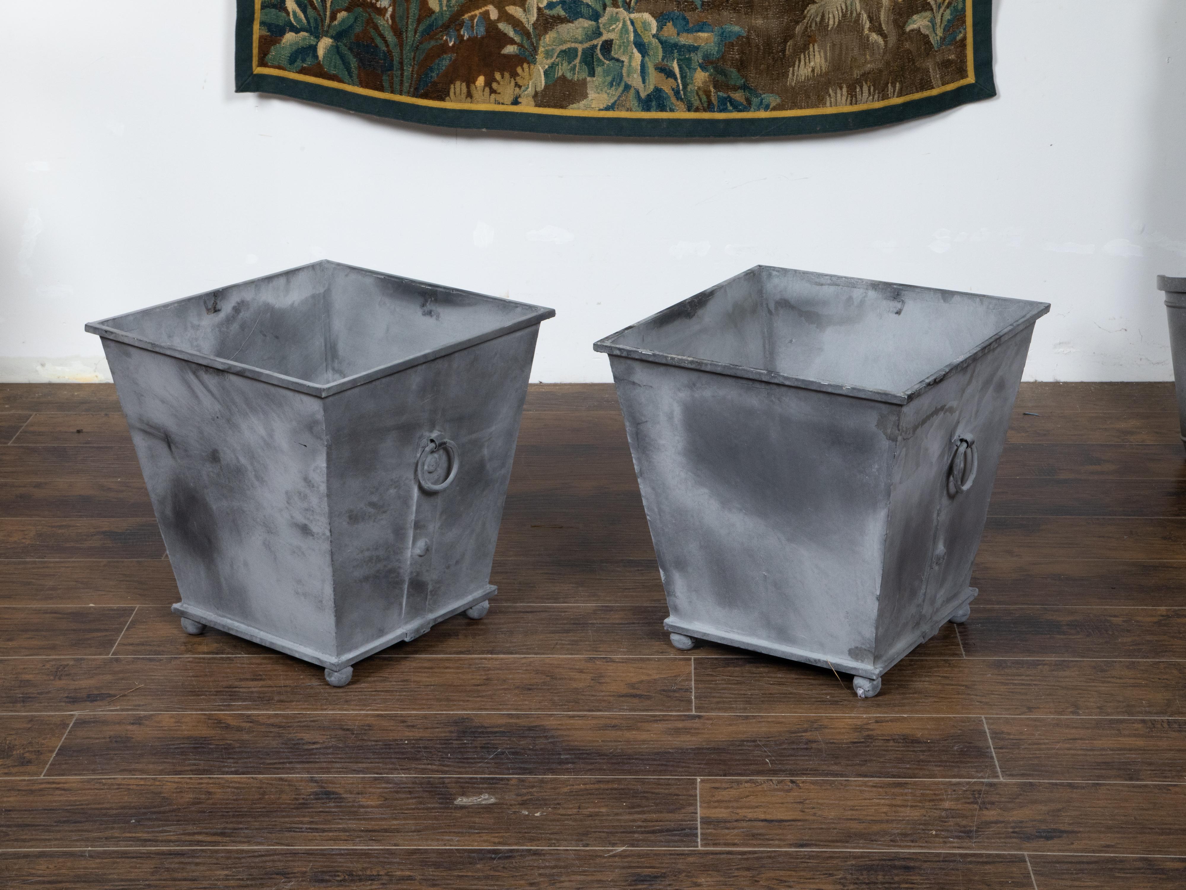 Pair of Vintage Grey Metal Planters with Tapered Lines, Ring Pulls and Ball Feet In Good Condition For Sale In Atlanta, GA