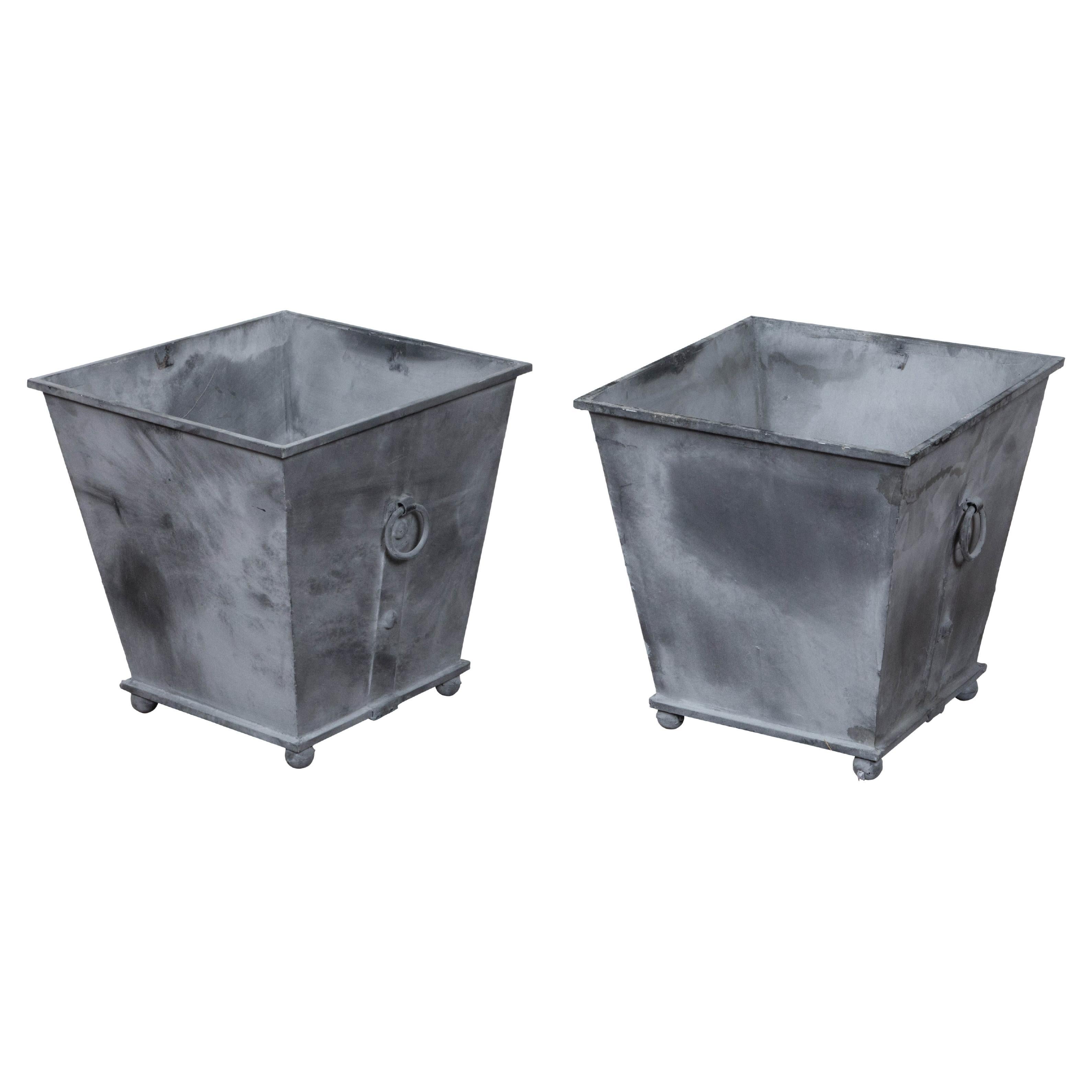 Pair of Vintage Grey Metal Planters with Tapered Lines, Ring Pulls and Ball Feet For Sale