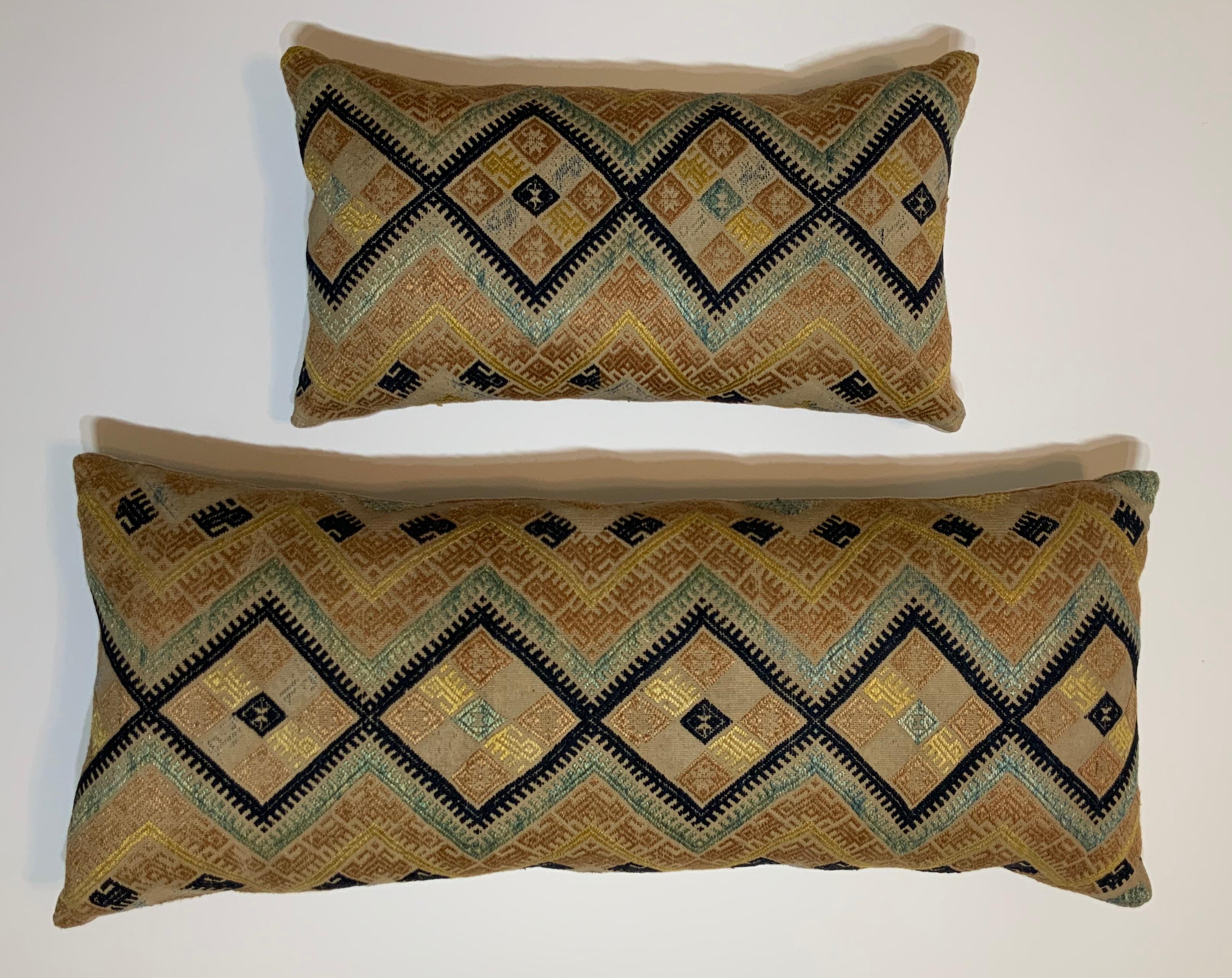 Beautiful pair of pillows made of hand embroidery silk on cotton cream color background. Primitive geometric and lions motifs. Linen backing, fresh inserts.
Sizes 
Measures: 17” x 9”.5 x 5”
27” x 11” x 5”.